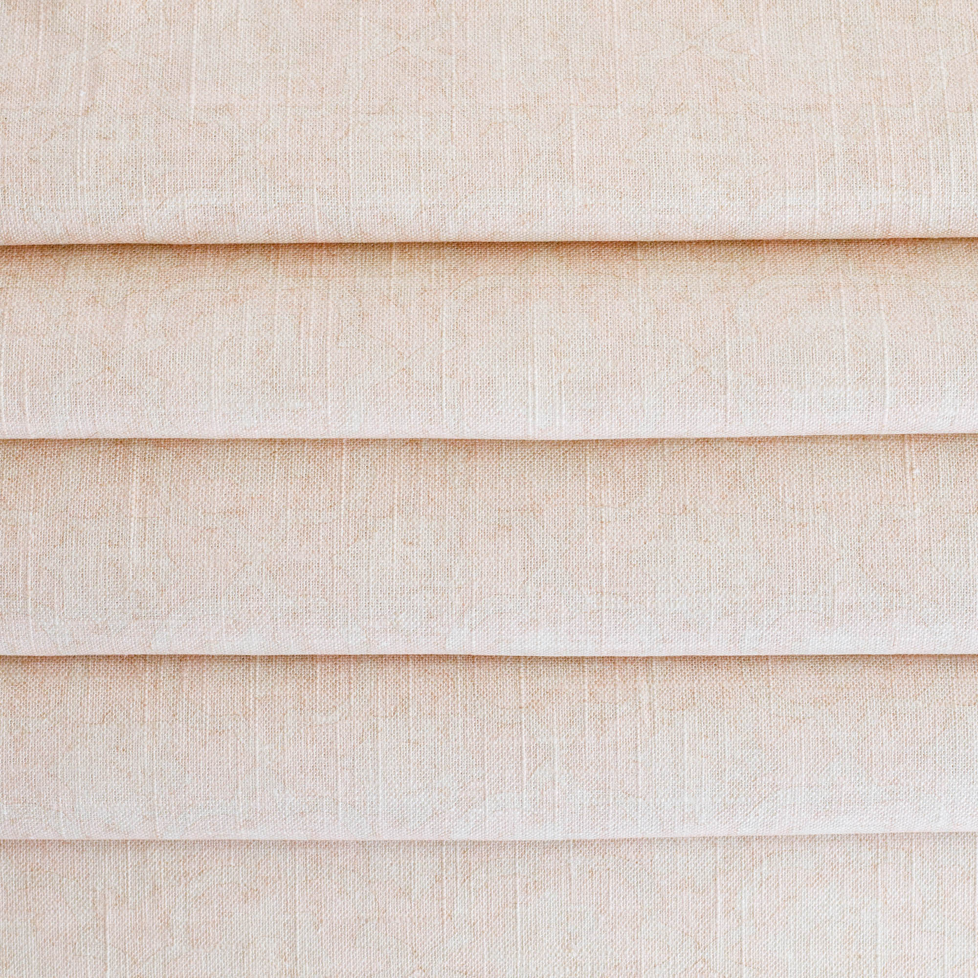 a soft pink subtle medallion pattern linen blend fabric