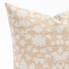 a warm gold and cream abstract botanical patterned throw pillow : close up view