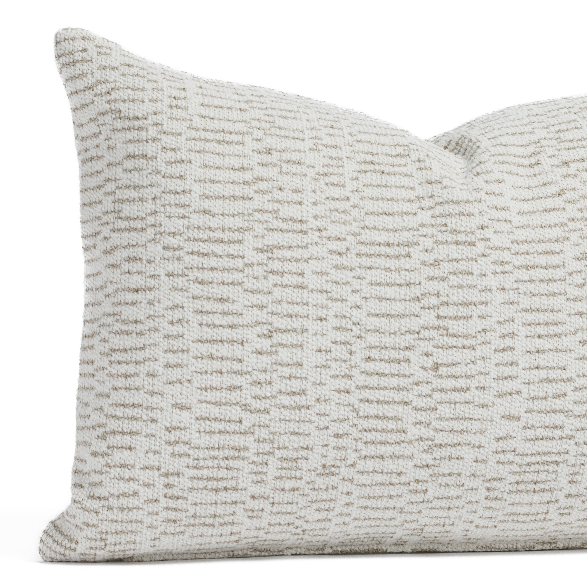 Avani Sand, a cream throw pillow with an organic thatched line pattern: close-up view.