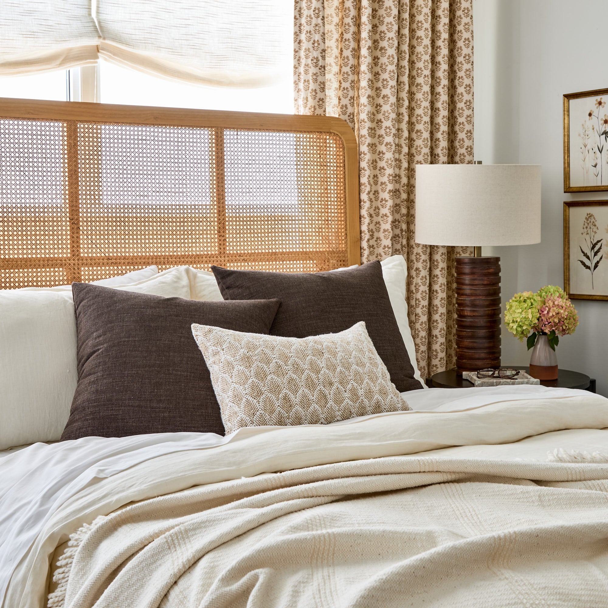 Bedford Coffee Brown 22x22 throw pillows styled on bed with Baker Burlap 14x20 lumbar cushion from Tonic Living.