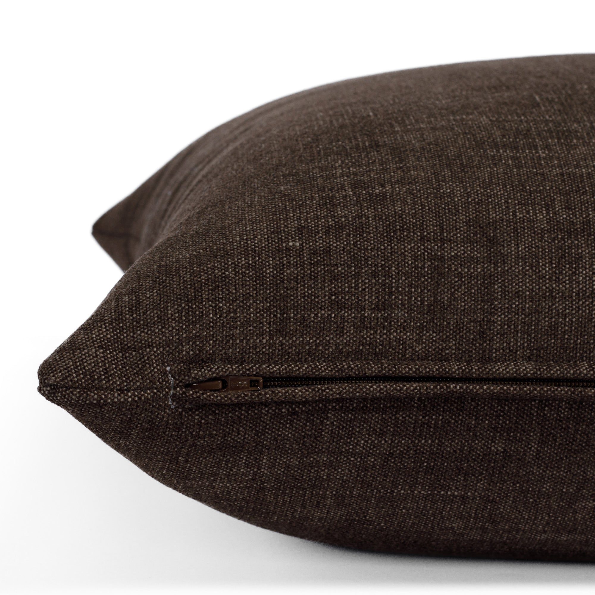 Zipper detail of Bedford Coffee toss pillow, Tonic Living chenille fabric in warm brown tone.