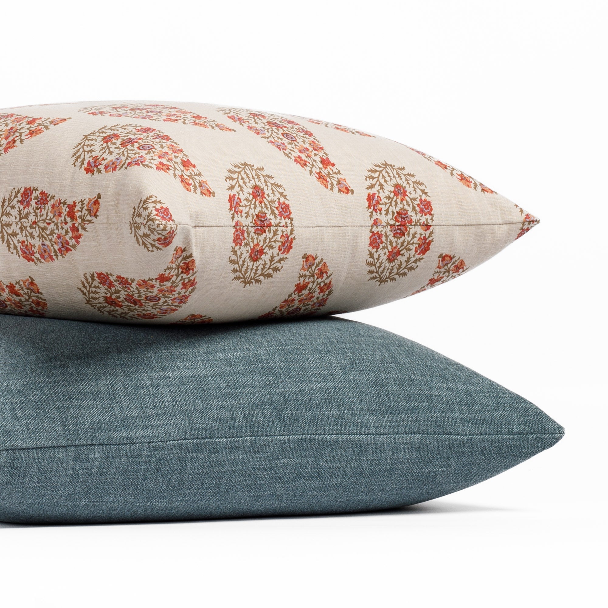 Stacked Tonic Living pillows: Bedford Denim blue pillow with Grace Rosewood paisley pillow.