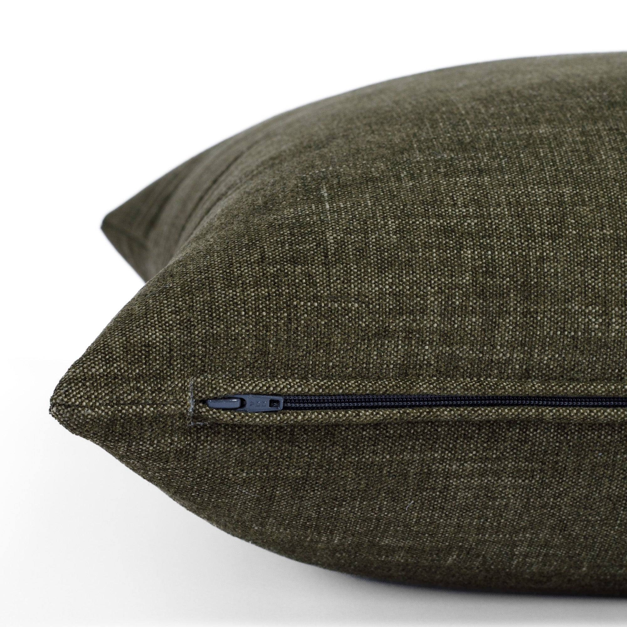 Zipper detail of Bedford Moss toss pillow, Tonic Living chenille fabric in earthy olive green tone.
