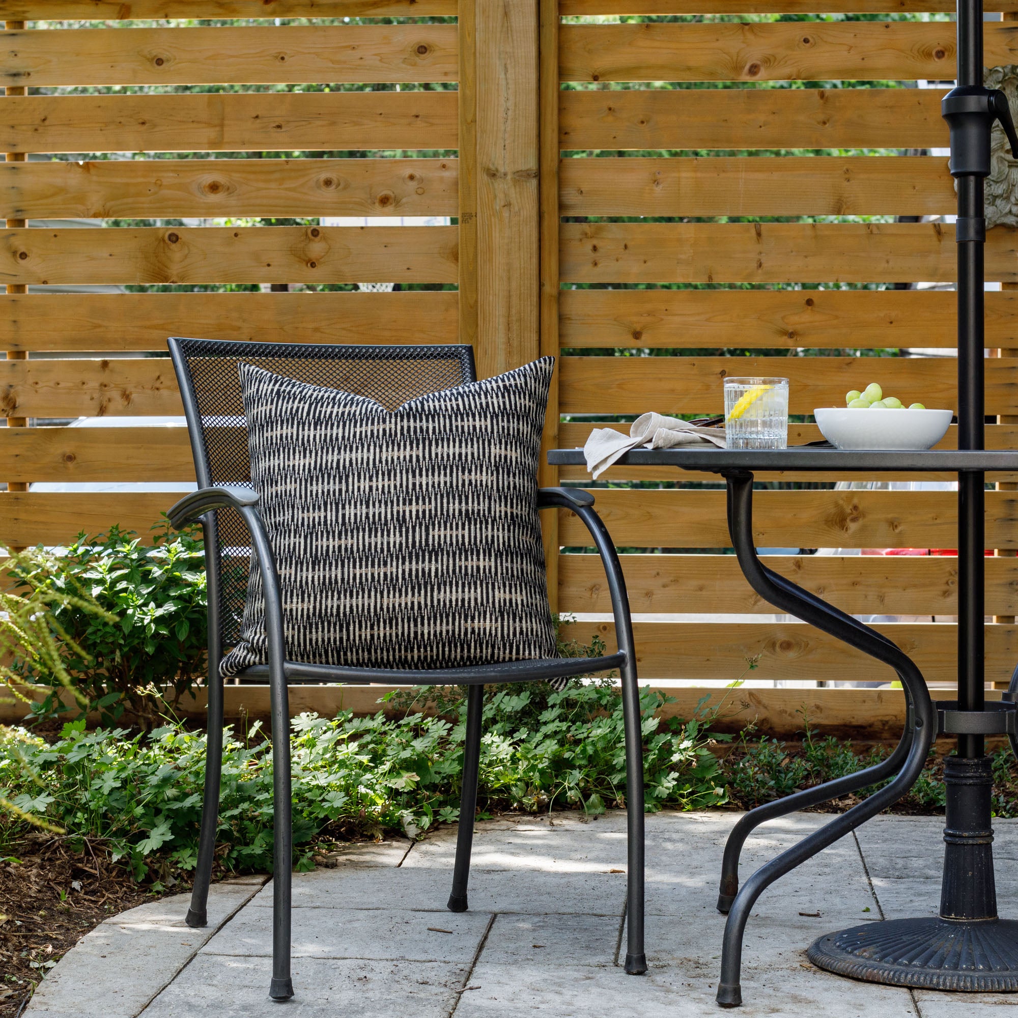 A modern black and tan outdoor cushion from Tonic Living.