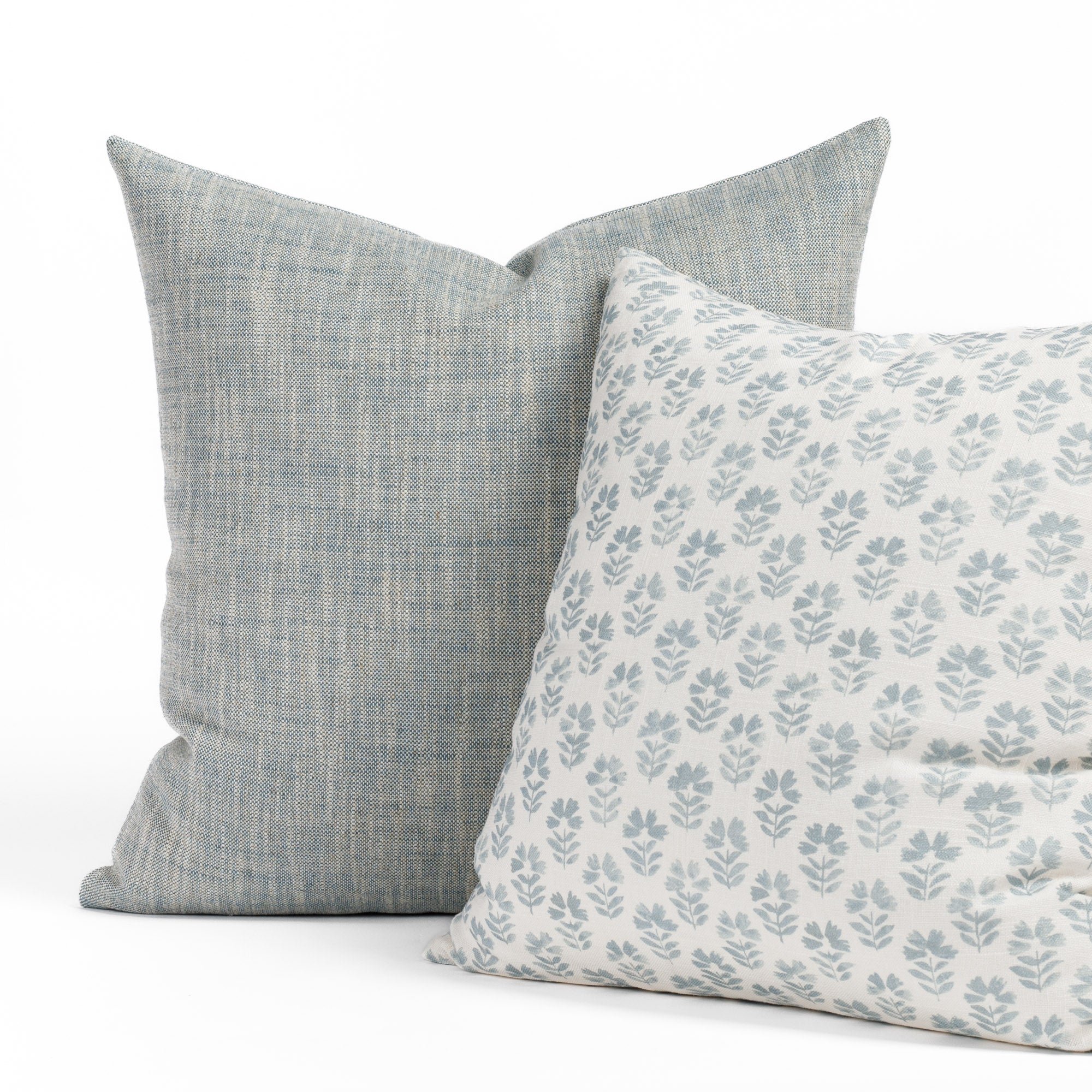 Brussels Sky Blue 22x22 pillow paired with the Carmel Sky Blue & White floral pillow from Tonic Living.