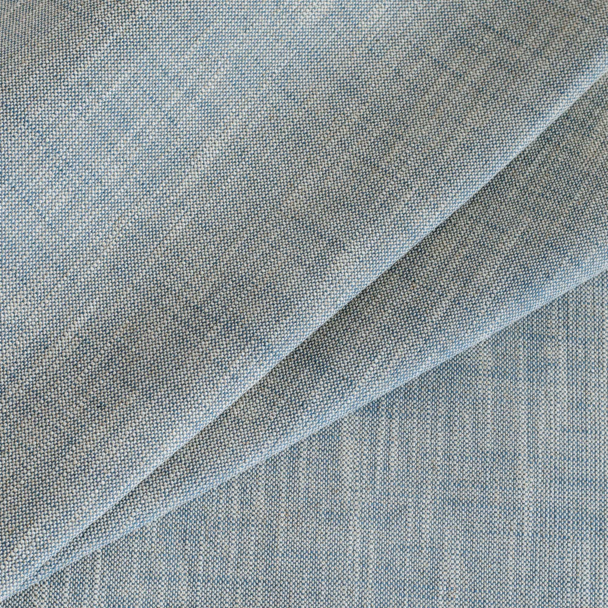Brussels Sky Blue, a soft blue and natural high-performance fabric from Tonic Living.