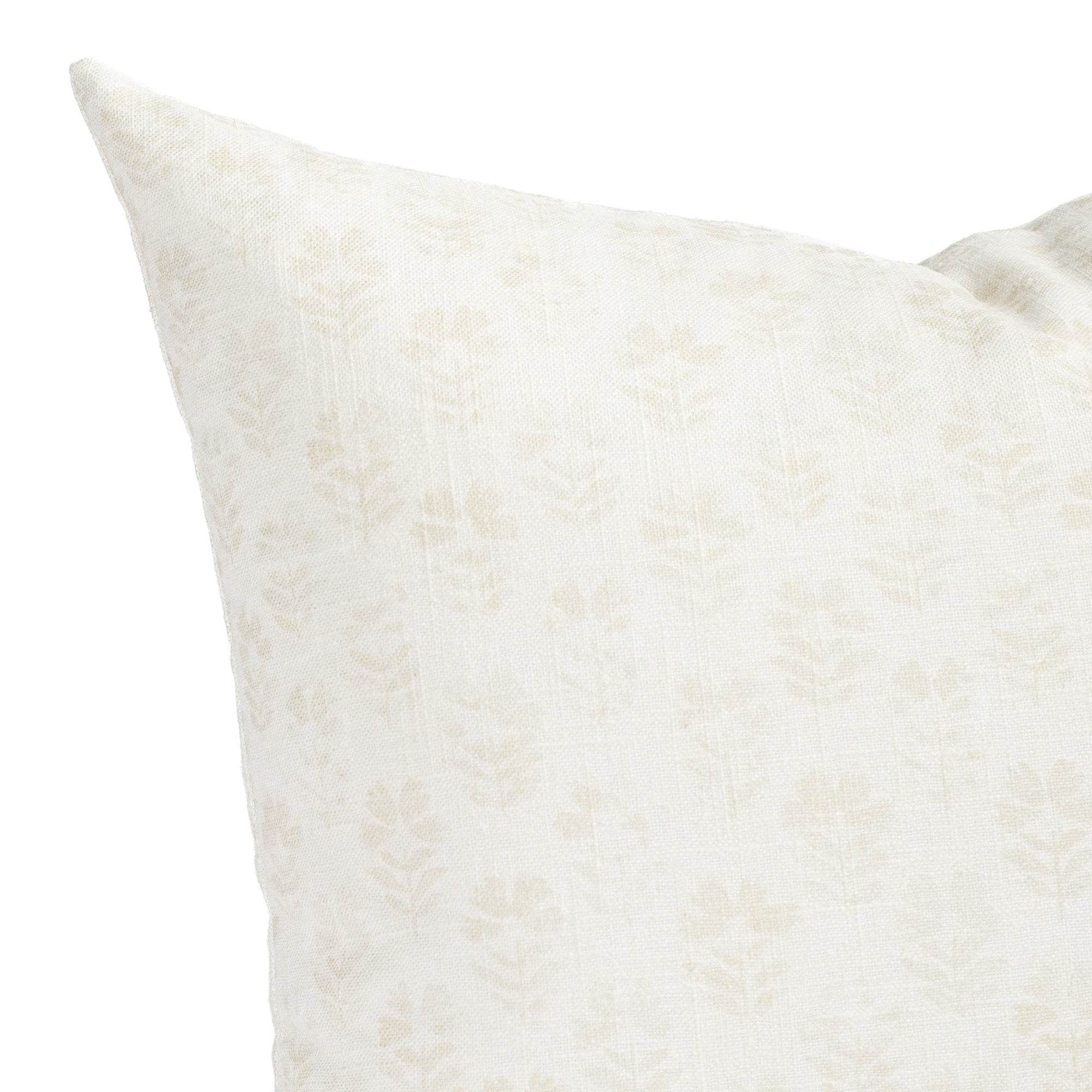 a subtle cream tonal floral block print pillow : close up view