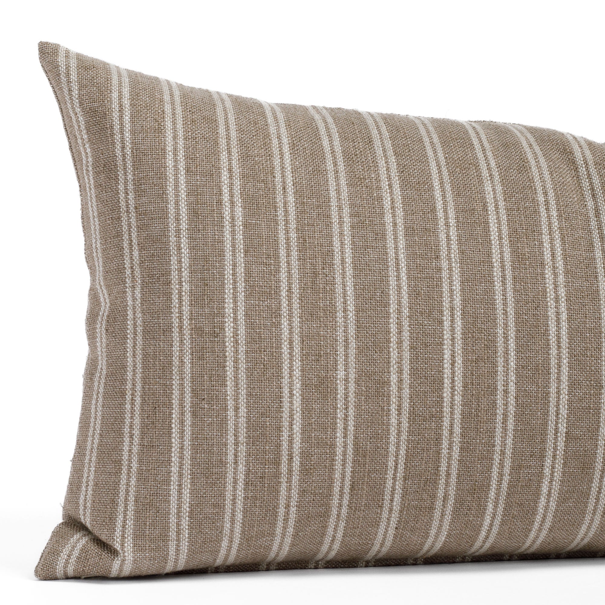 Close-up of Tonic Living’s Conway Stripe Bark 12x24 lumbar (small bolster pillow), highlighting the narrow vertical stripes in grounded brown tones and the subtle, textured linen-blend weave.