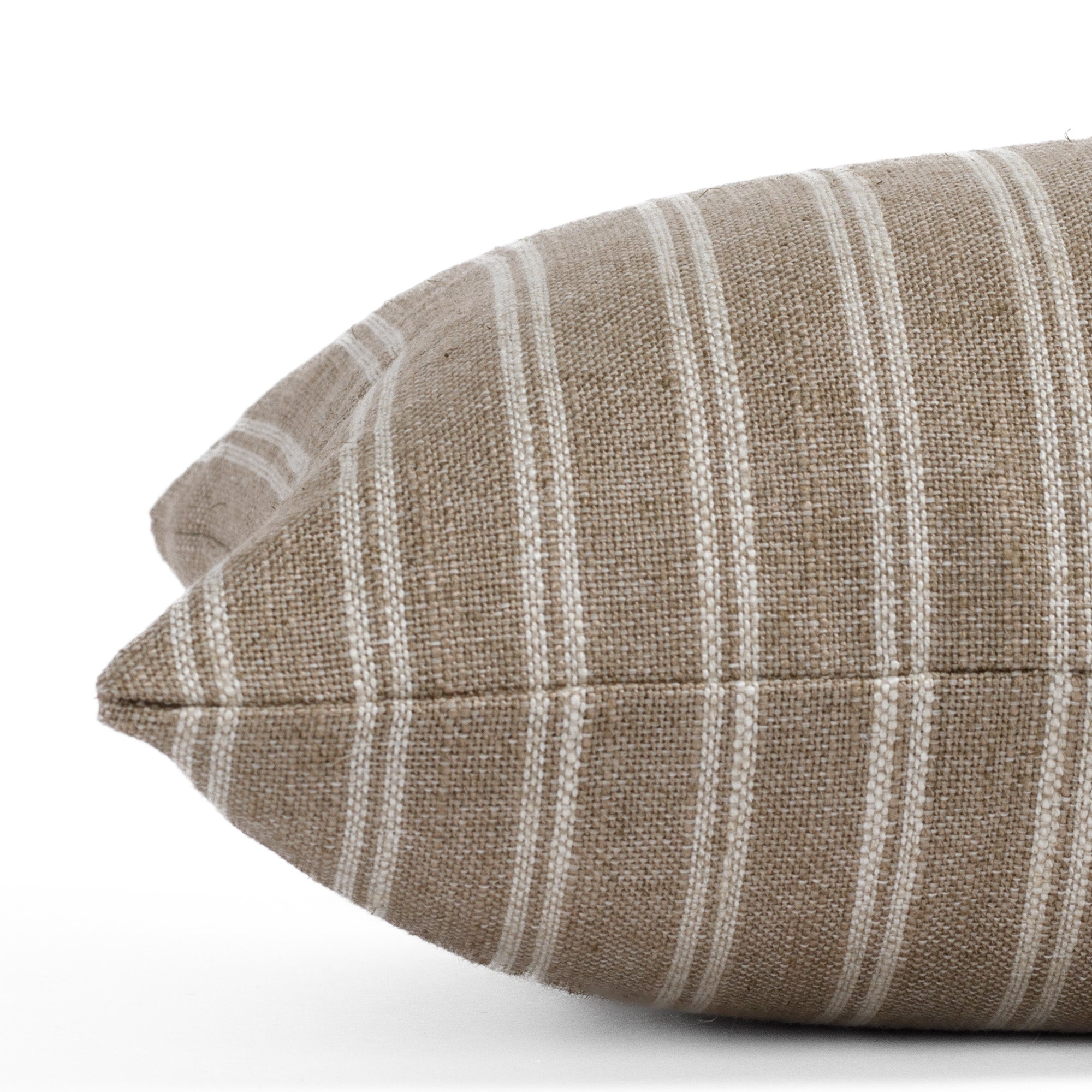 Detailed side close-up of the Conway Stripe Bark 12x24 lumbar pillow from Tonic Living, emphasizing the vertical stripe pattern and earthy colour mix in oatmeal beige and bark-toned brown.