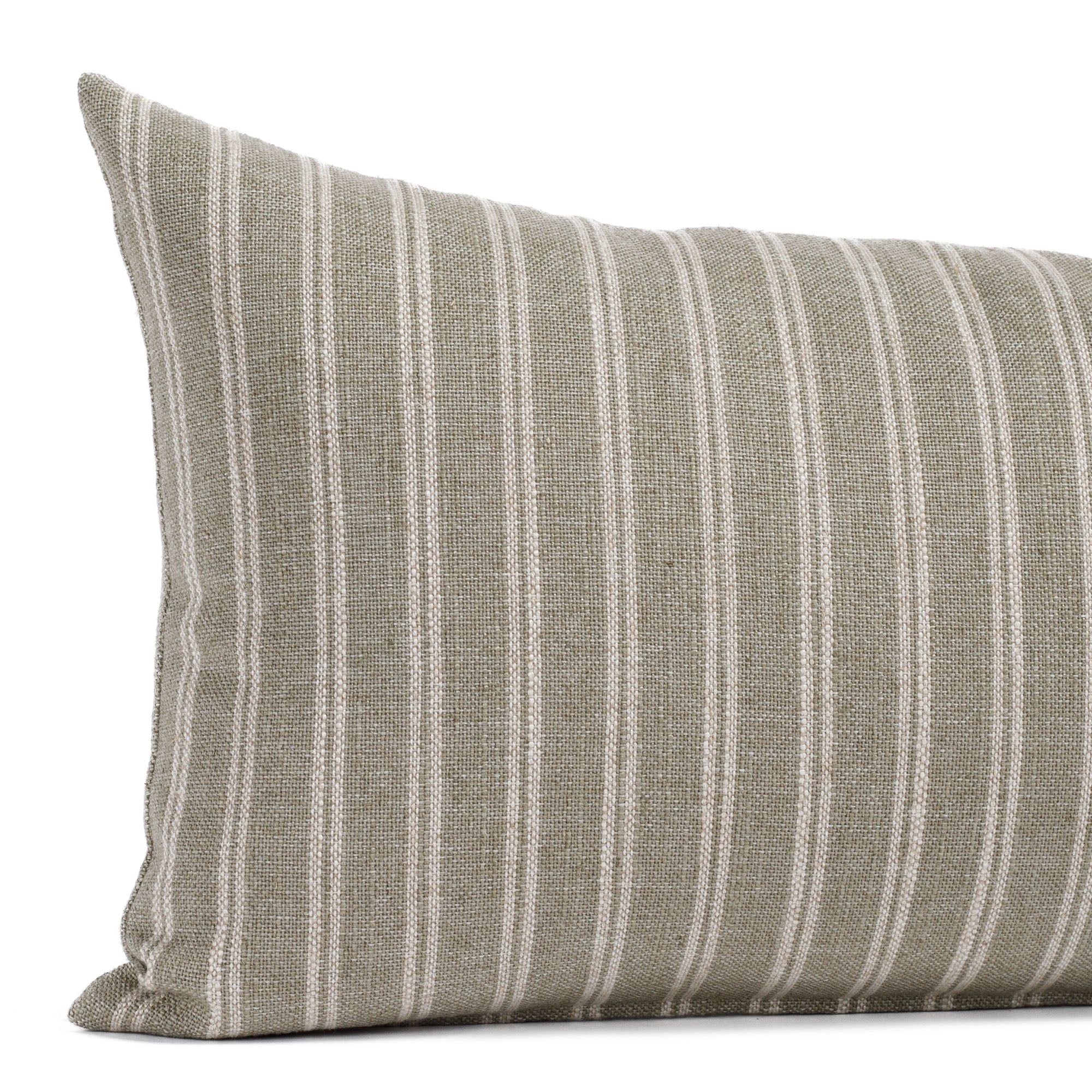 Close-up of Tonic Living’s Conway Stripe Sage 12x24 lumbar (small bolster pillow), highlighting the subtle vertical stripes in muted green and beige tones with natural linen-blend texture.