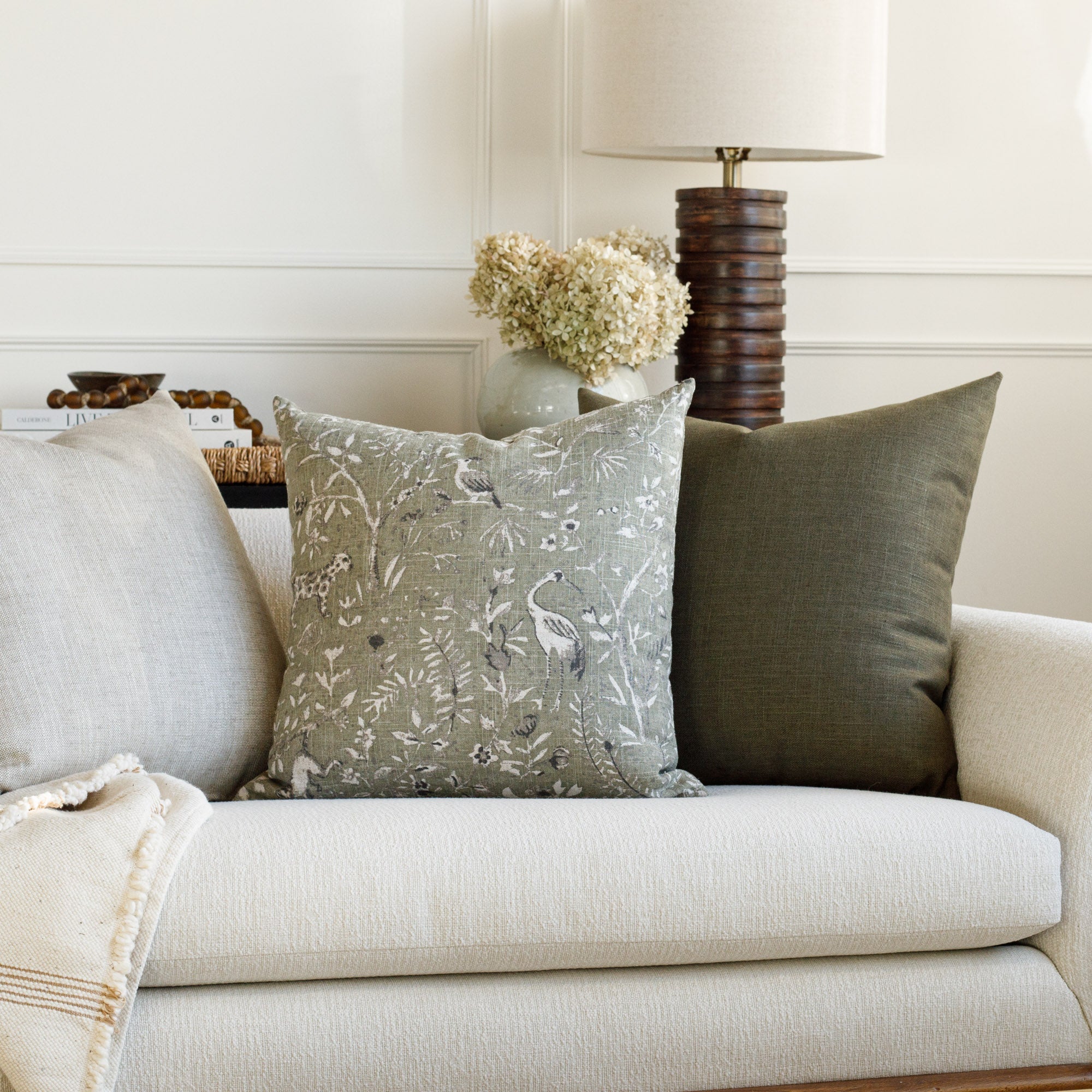 Living room with Cyprus Moss green and Lincoln Moss green pillows styled on a sofa – Tonic Living