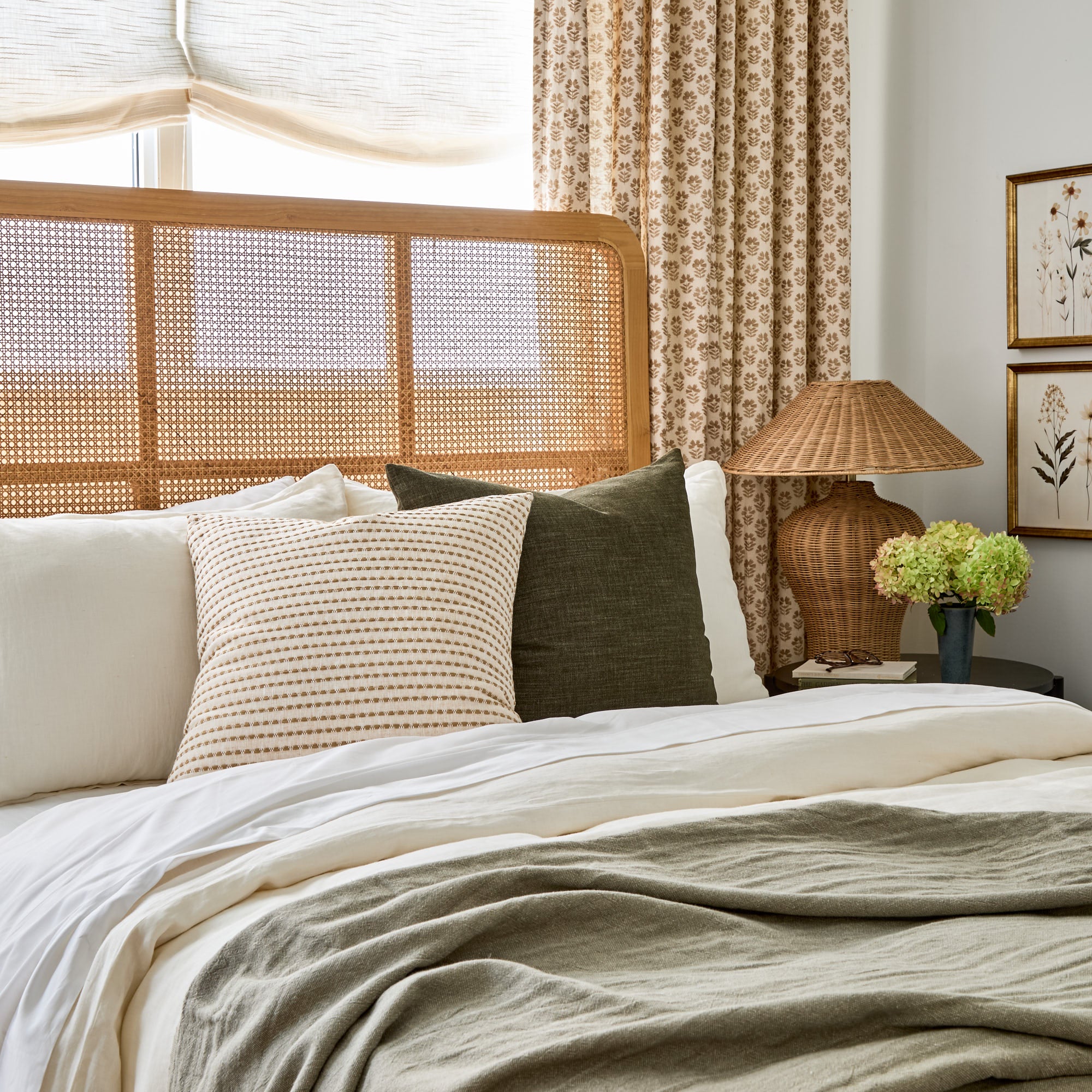 Bedford 22x22 moss green throw pillow styled on bed with Dash Stripe 22x22 cream & ochre from Tonic Living.