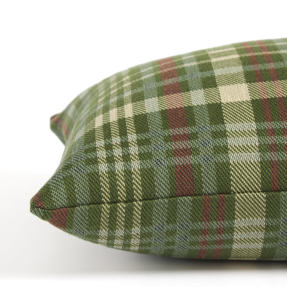 Side view of Tonic Living Dasher plaid lumbar pillow featuring a classic green and burgundy check pattern.