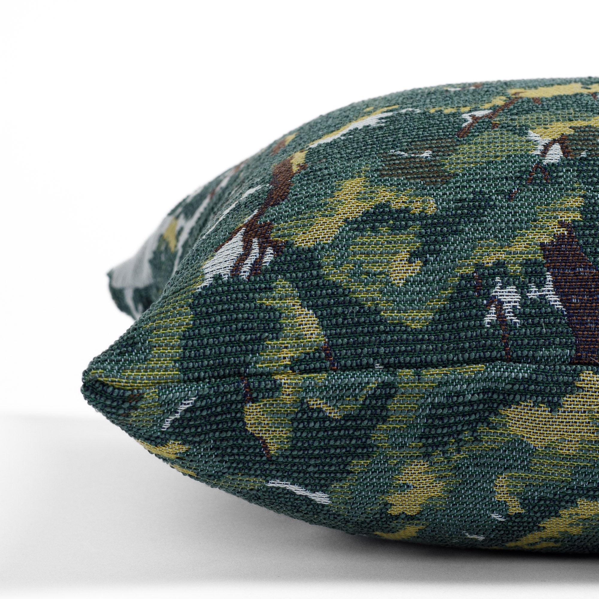 a forest jacquard tapestry patterned lumbar pillow: close up side view