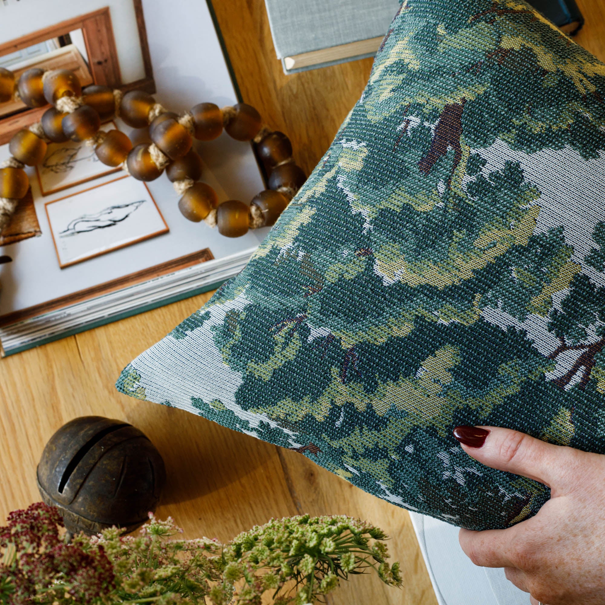 Elora Pillow : an earthy palette of deep forest green, bark brown, and hazy sky blue