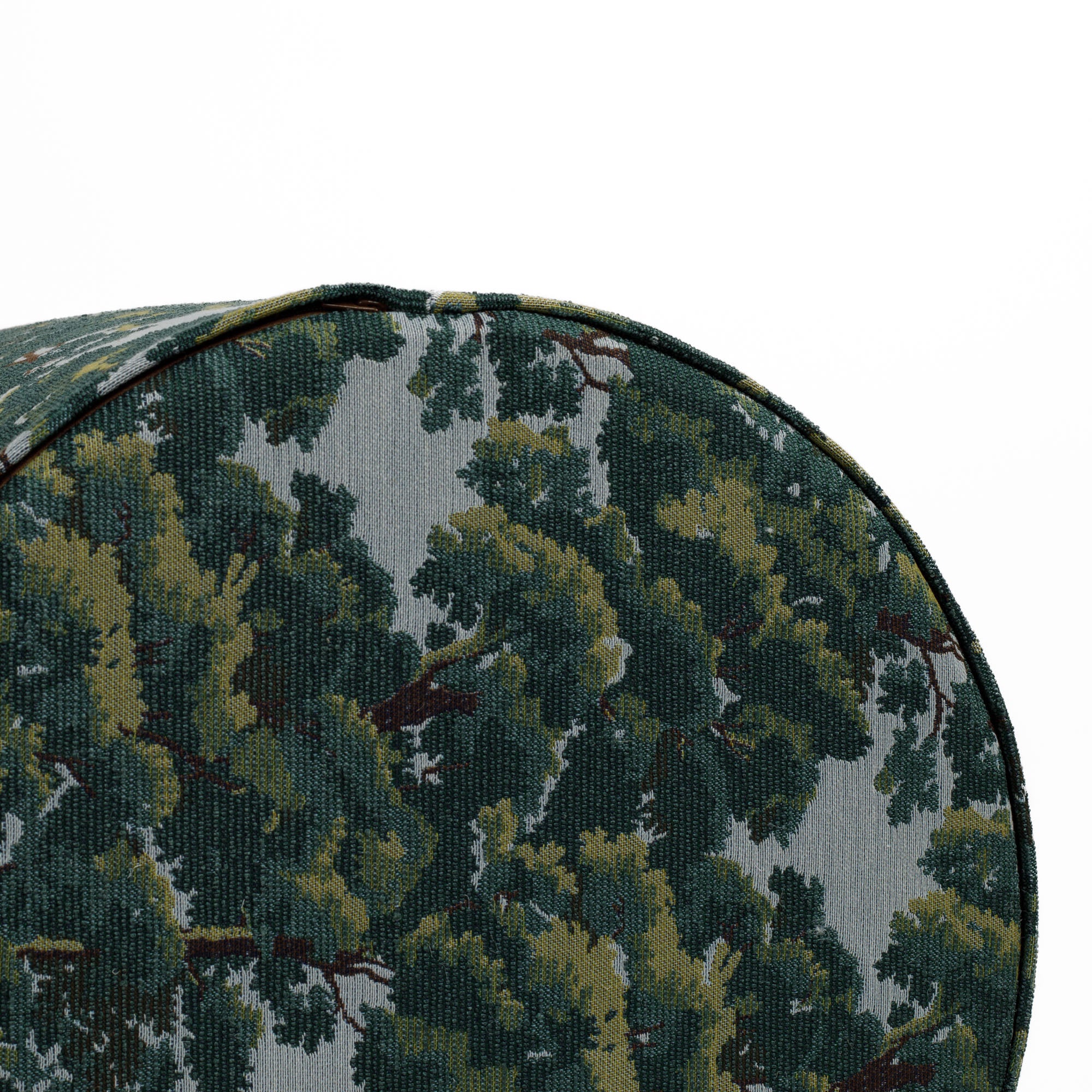 Bottom view of the Elora ottoman from Tonic Living, showing a discreet zipper and the tailored craftsmanship of the upholstery.