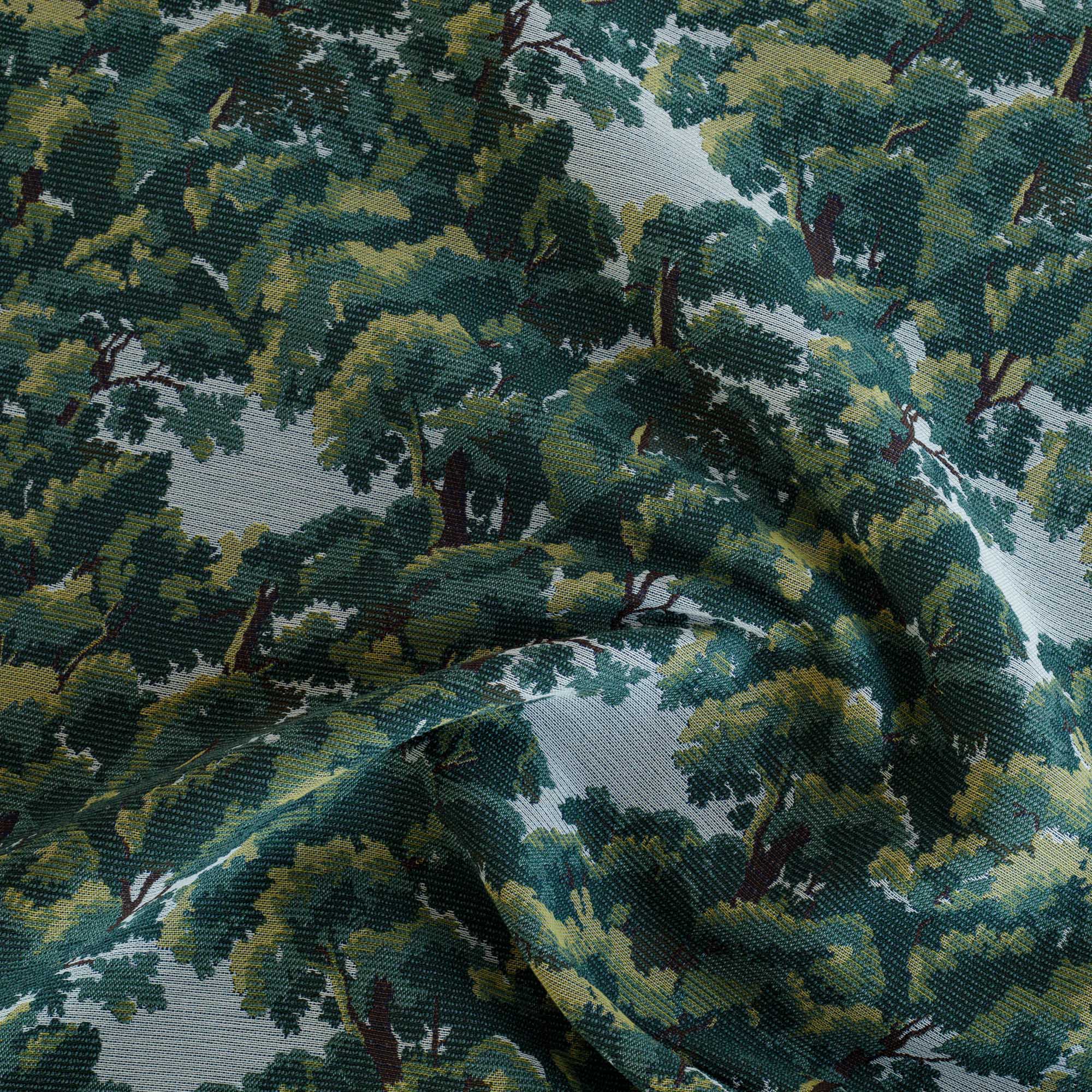a forest patterned jacquard upholstery fabric