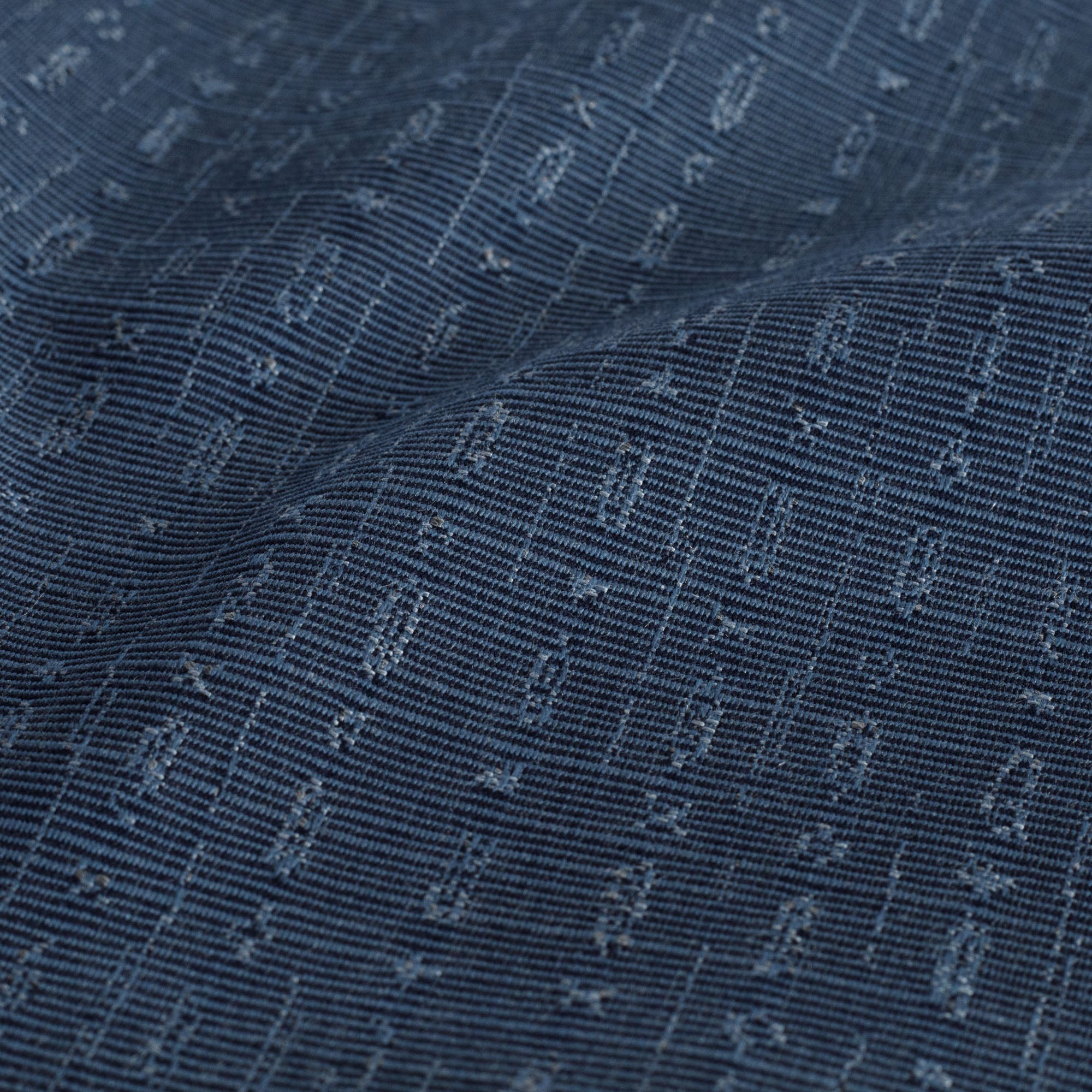 A navy blue indoor/outdoor home decor fabric from Tonic Living: close up view.