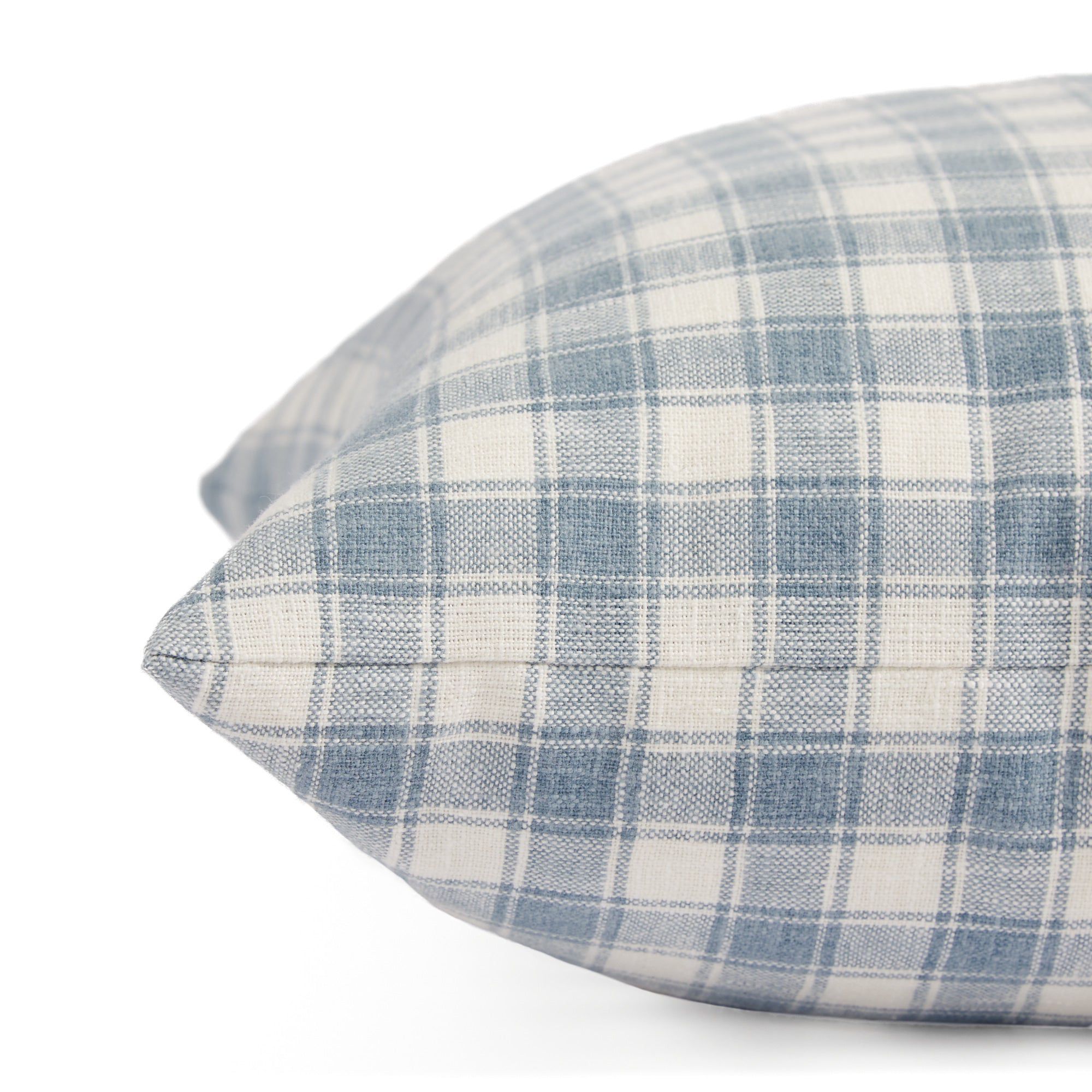 Side view of Tonic Living Emmett Plaid decorative cushion highlighting its timeless blue check design.