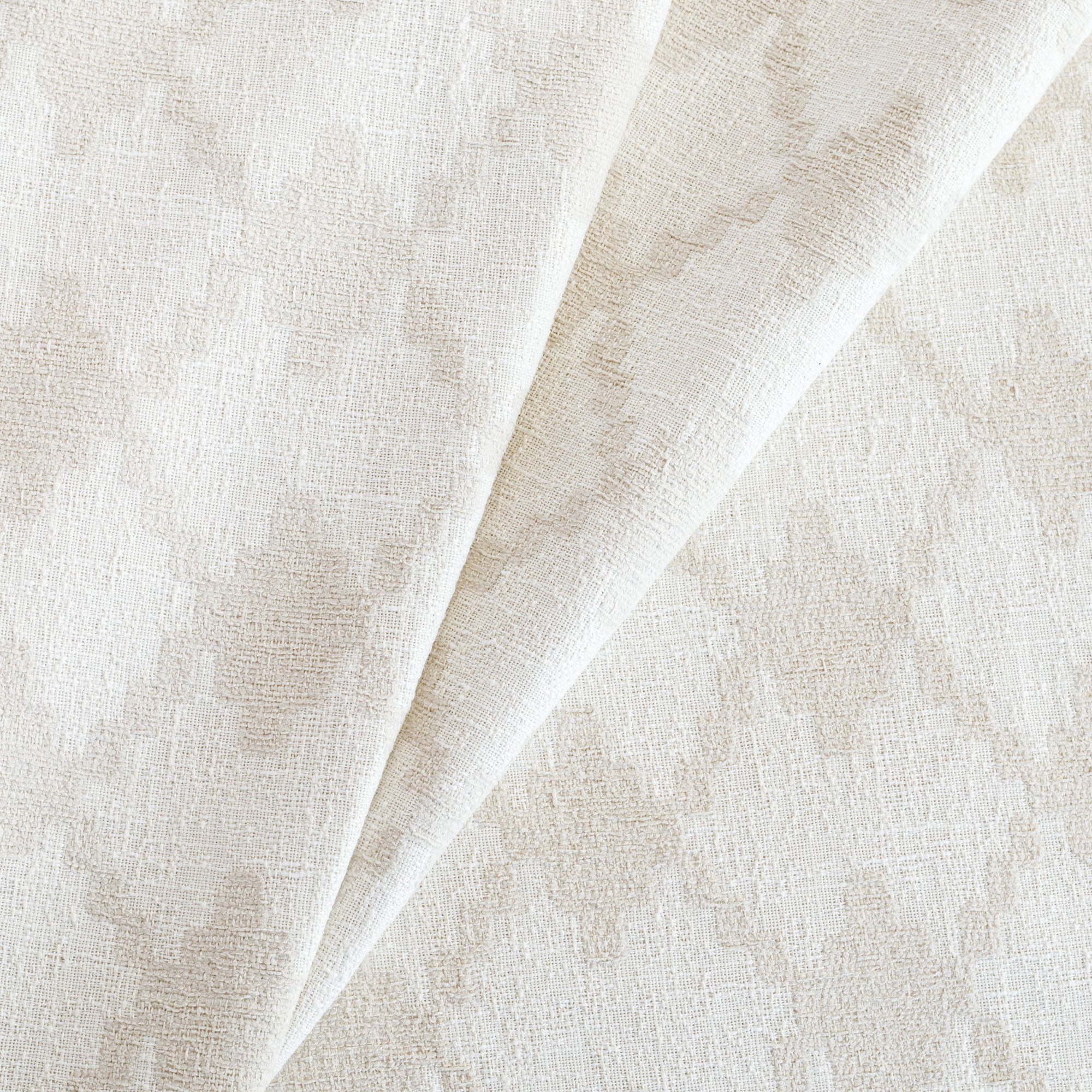 Fez InsideOut Fabric Toasted Coconut, a white and beige geometric tile patterned outdoor upholstery fabric from Tonic Living,