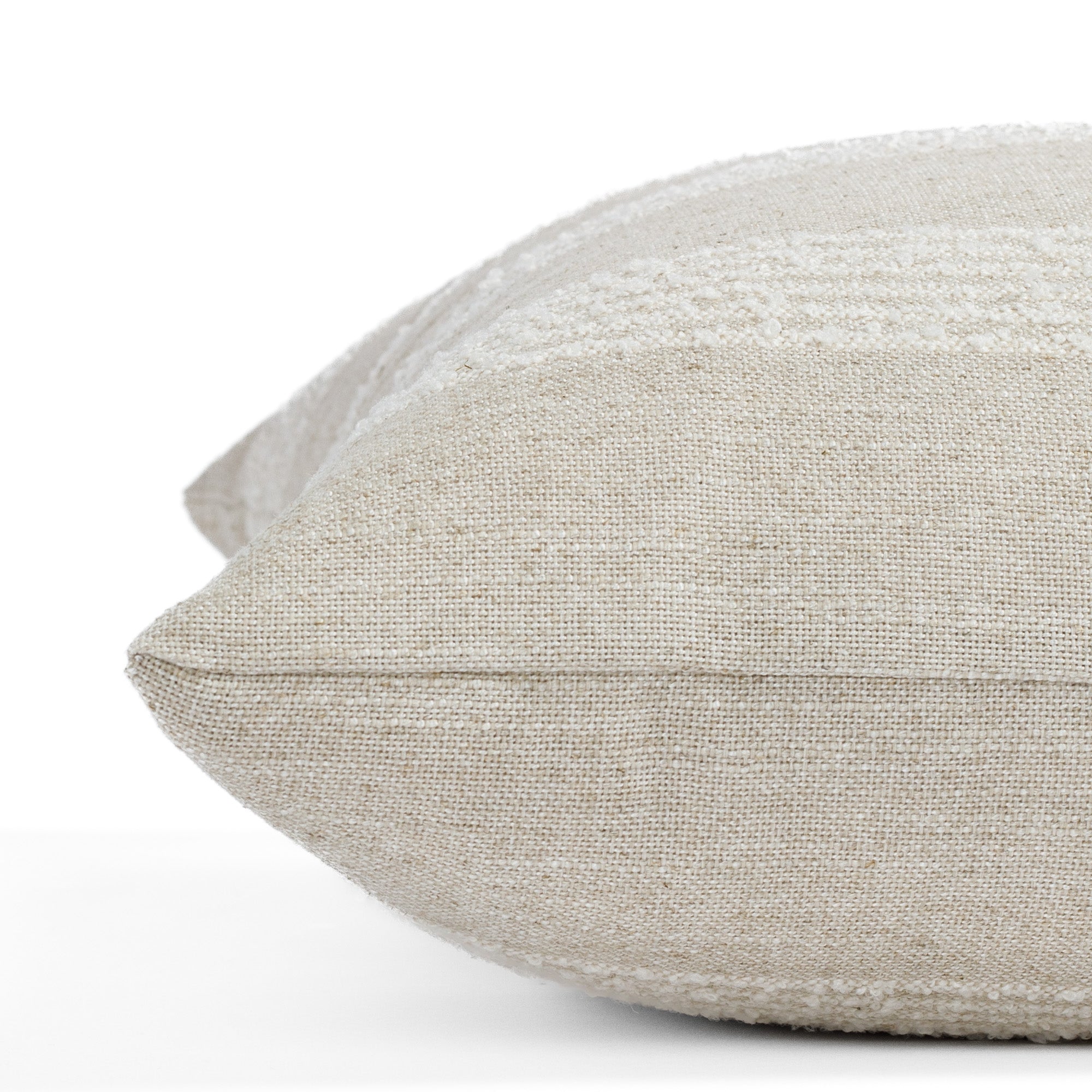 an off white and oatmeal chenille striped pillow : close up side view