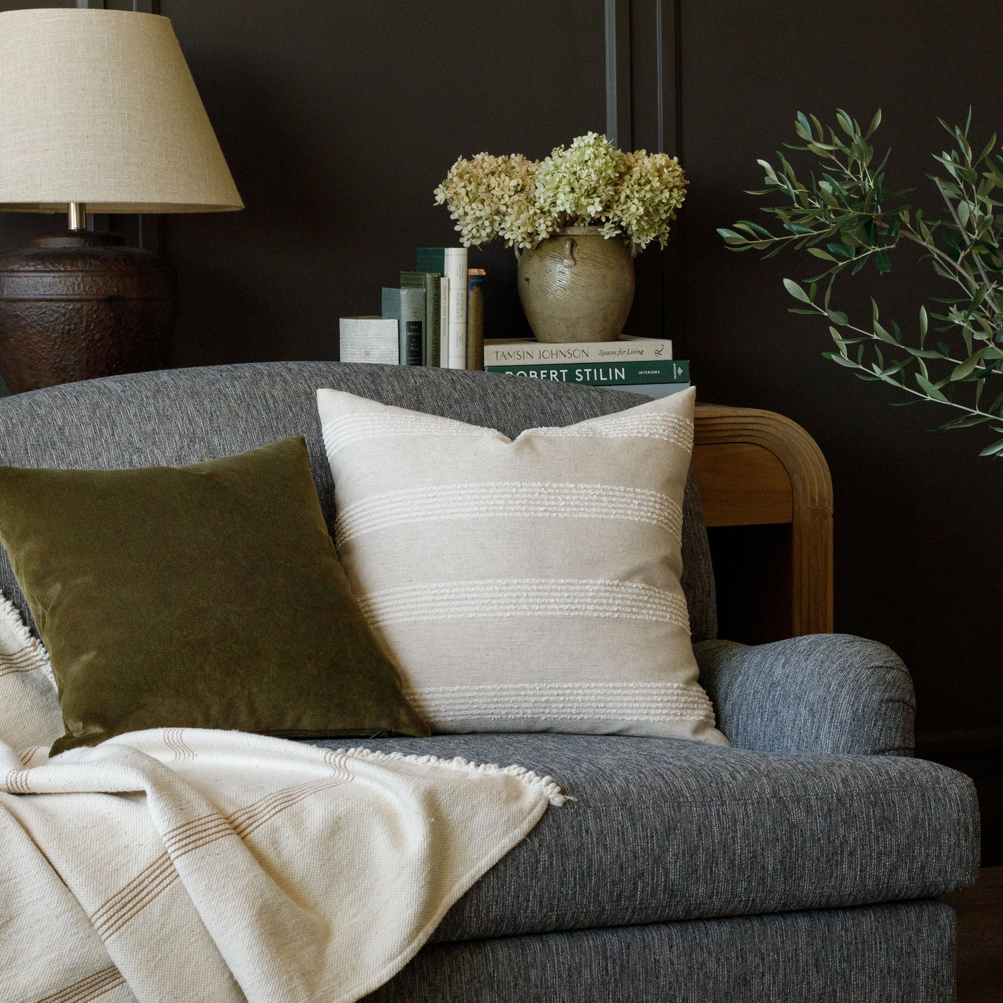 cozy Tonic Living home decor : Finn Stripe Natural and Valentina Velvet Balsam throw pillows on a Porter sable upholstered sofa