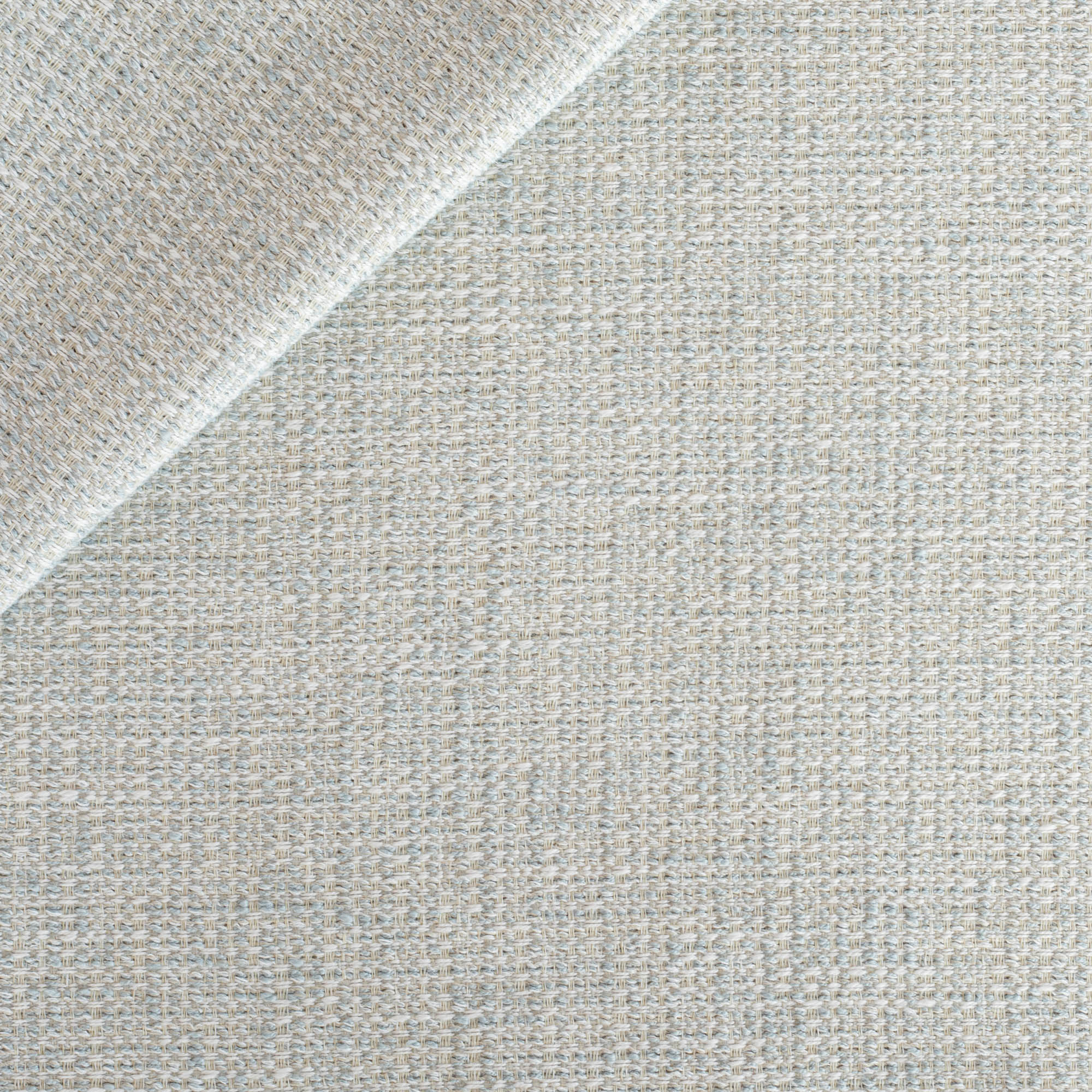 Flynn InsideOut Mist, a cool sky blue tweedy textured outdoor fabric from Tonic Living