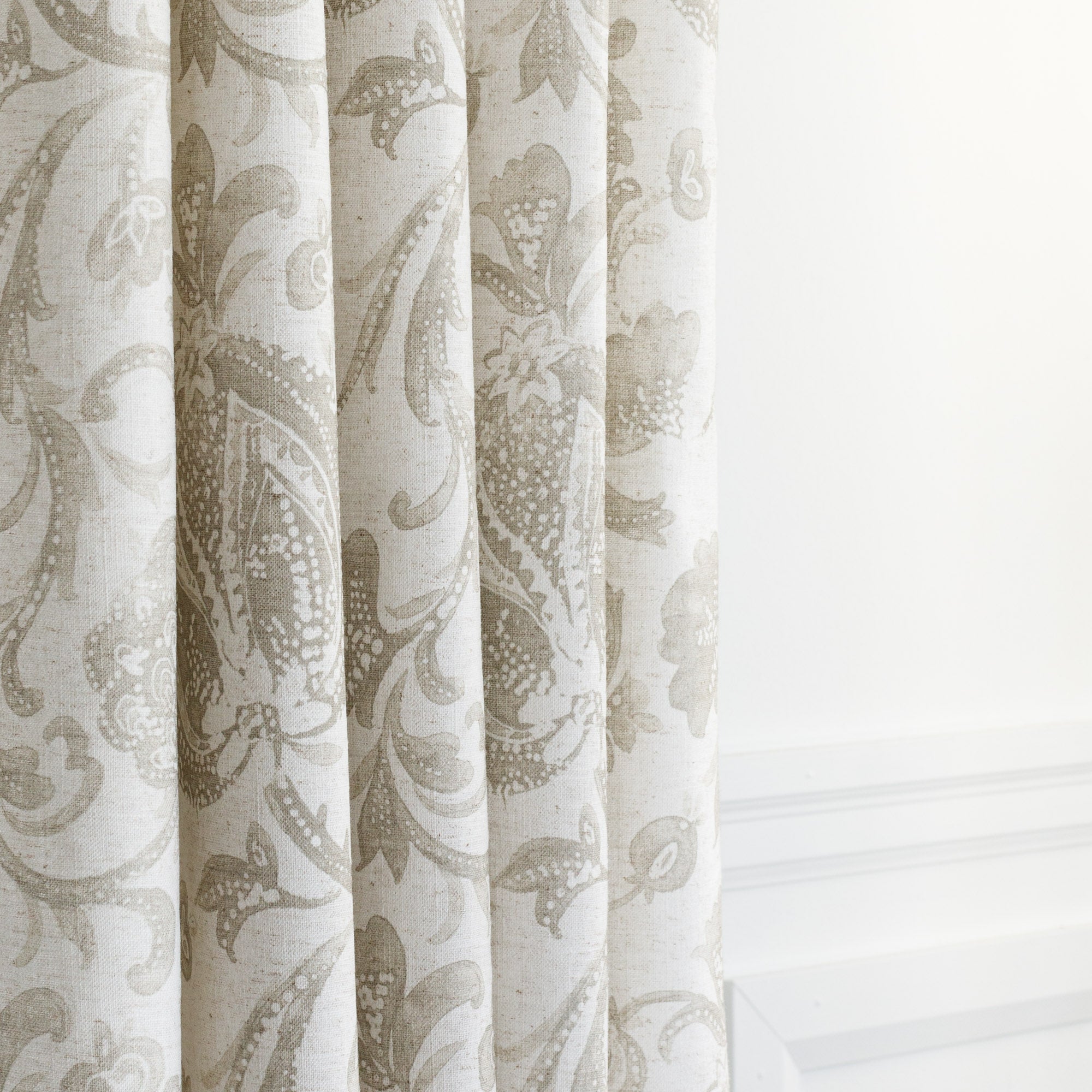 an oatmeal and earthy gray drapery fabric