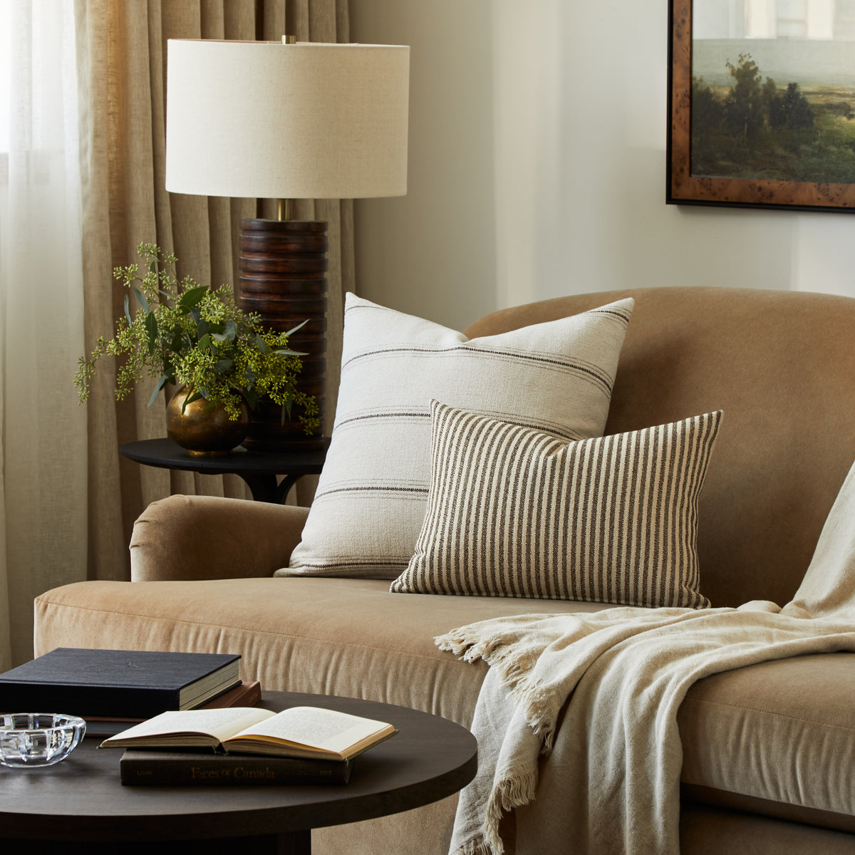 Tonic Living Gibson Stripe Birch decorative pillow styled on a sofa with a coordinating neutral striped lumbar cushion.