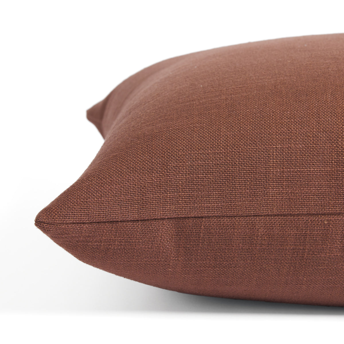 Side view of Tonic Living Hampton Burgundy toss cushion highlighting its deep burgundy colour and linen-look texture.
