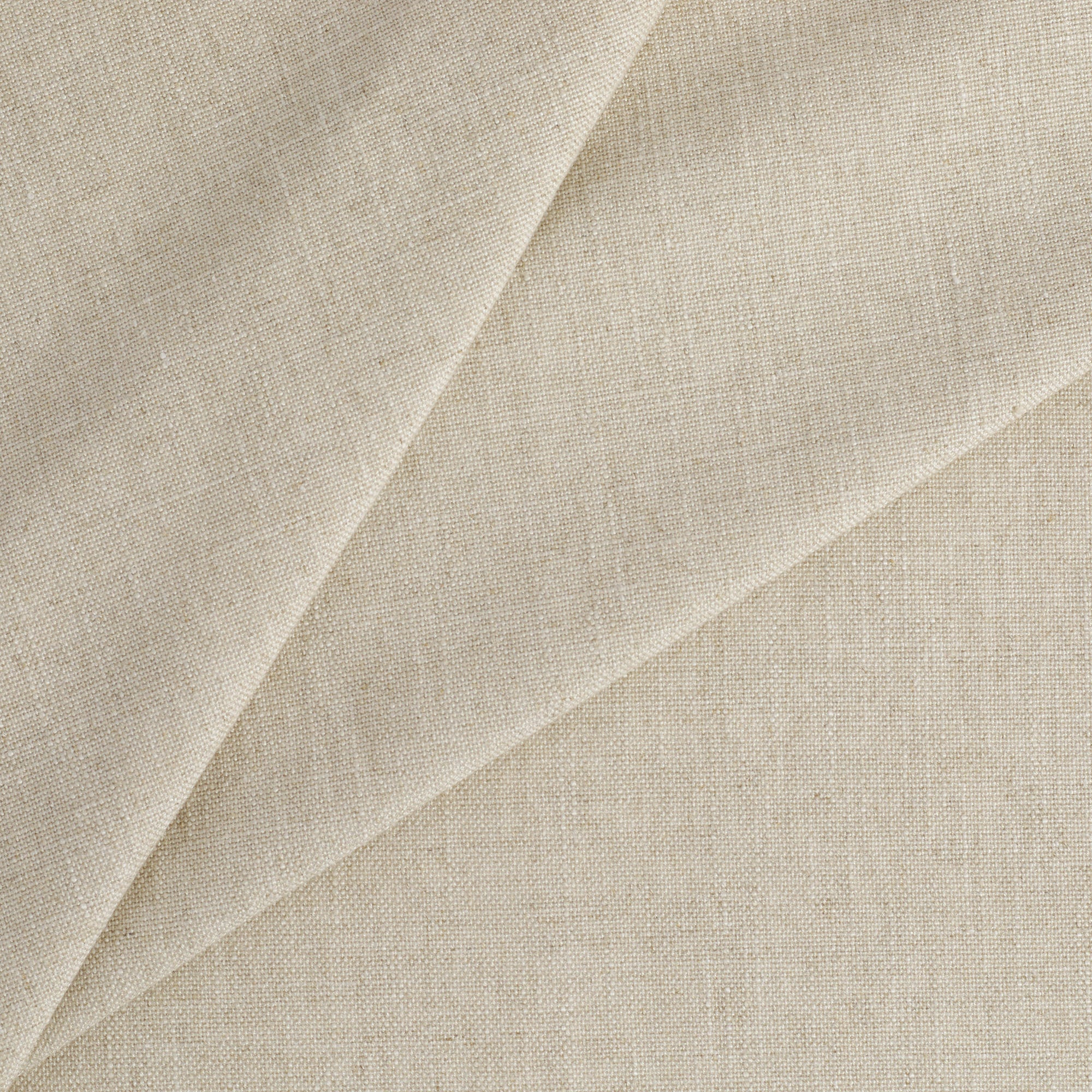 Tonic Living Hampton Oatmeal upholstery fabric featuring a neutral beige tone with Belgian linen look and feel.