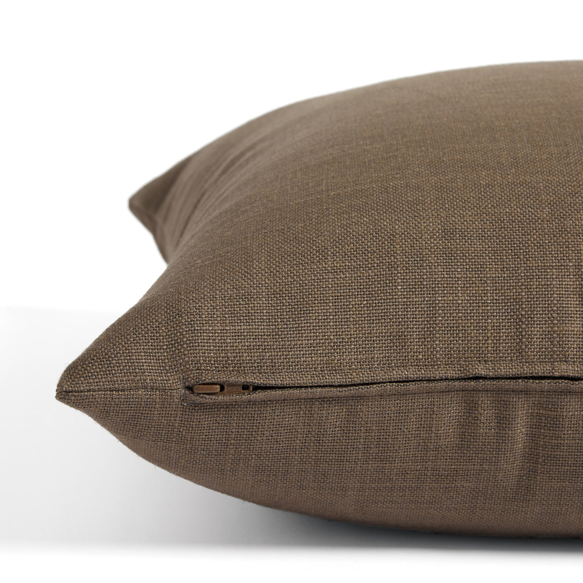 Side zipper detail of Tonic Living Hampton 22x22 pillow in smoky walnut brown with a linen-inspired texture.