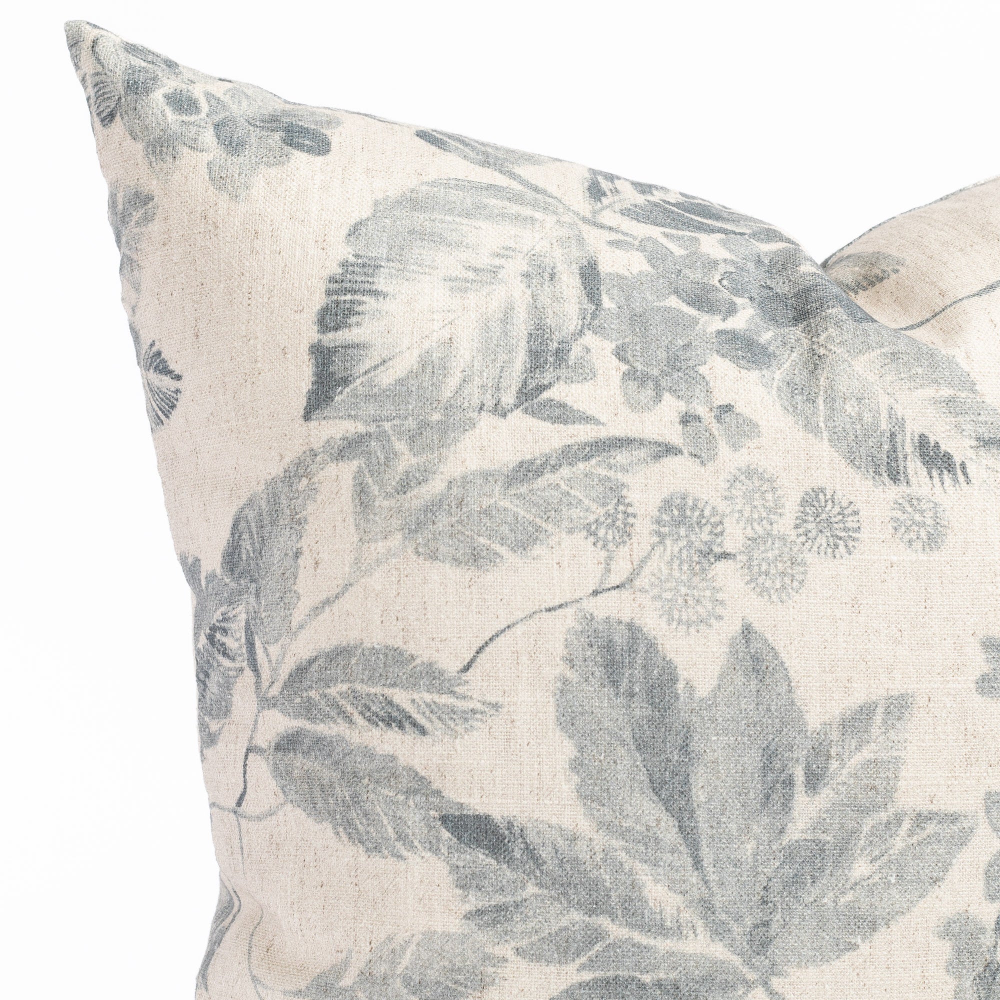 an indigo blue and oatmeal vintage floral print pillow : close up view