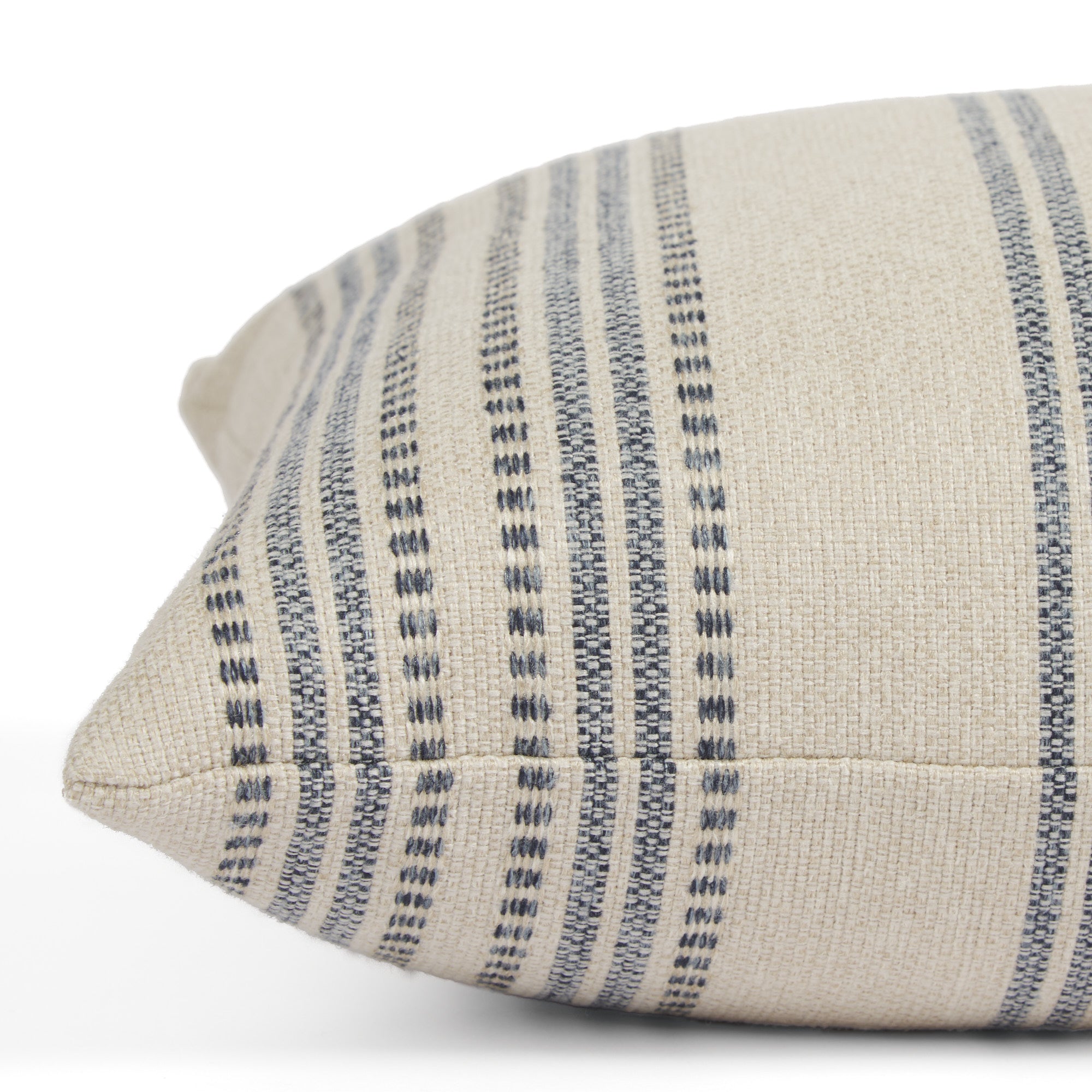 Side view of Tonic Living Hopper Stripe extra large lumbar pillow highlighting its textured layered stripe pattern.