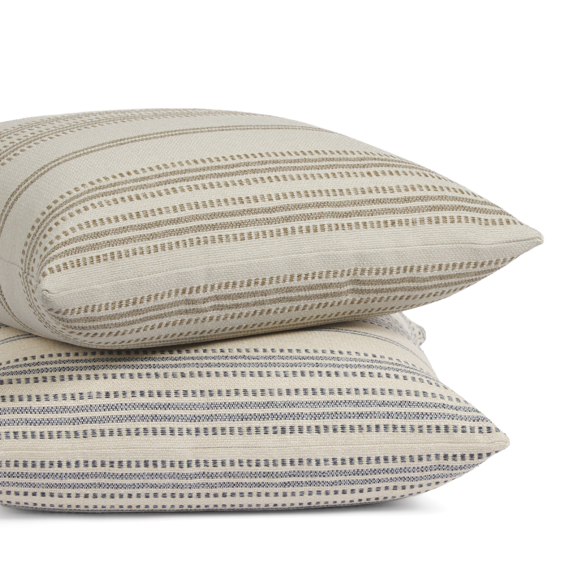 Tonic Living Hopper Stripe throw pillows in Denim and Toffee stacked together, featuring layered stripe designs in blue and brown tones.