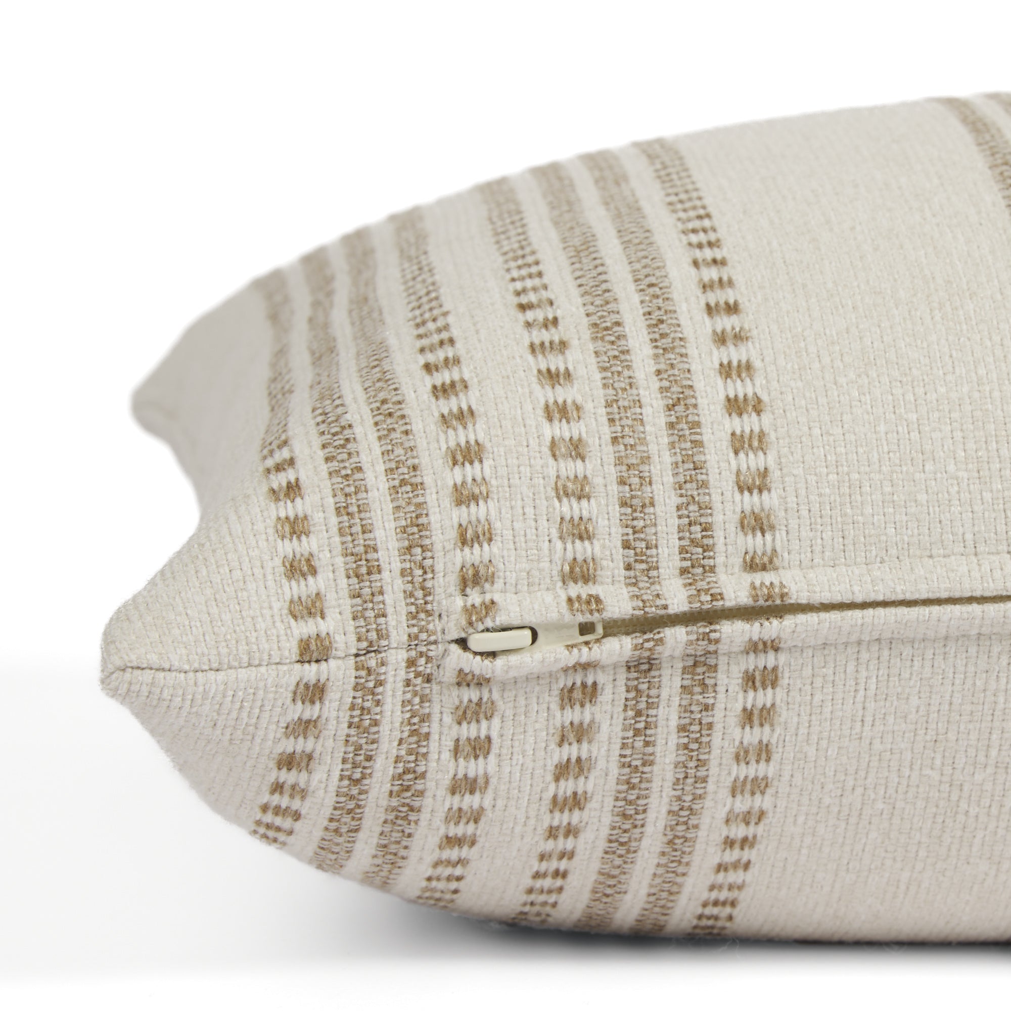 Side zipper detail of Tonic Living Hopper Stripe 16x42 bolster pillow in a neutral oatmeal and brown stripe.