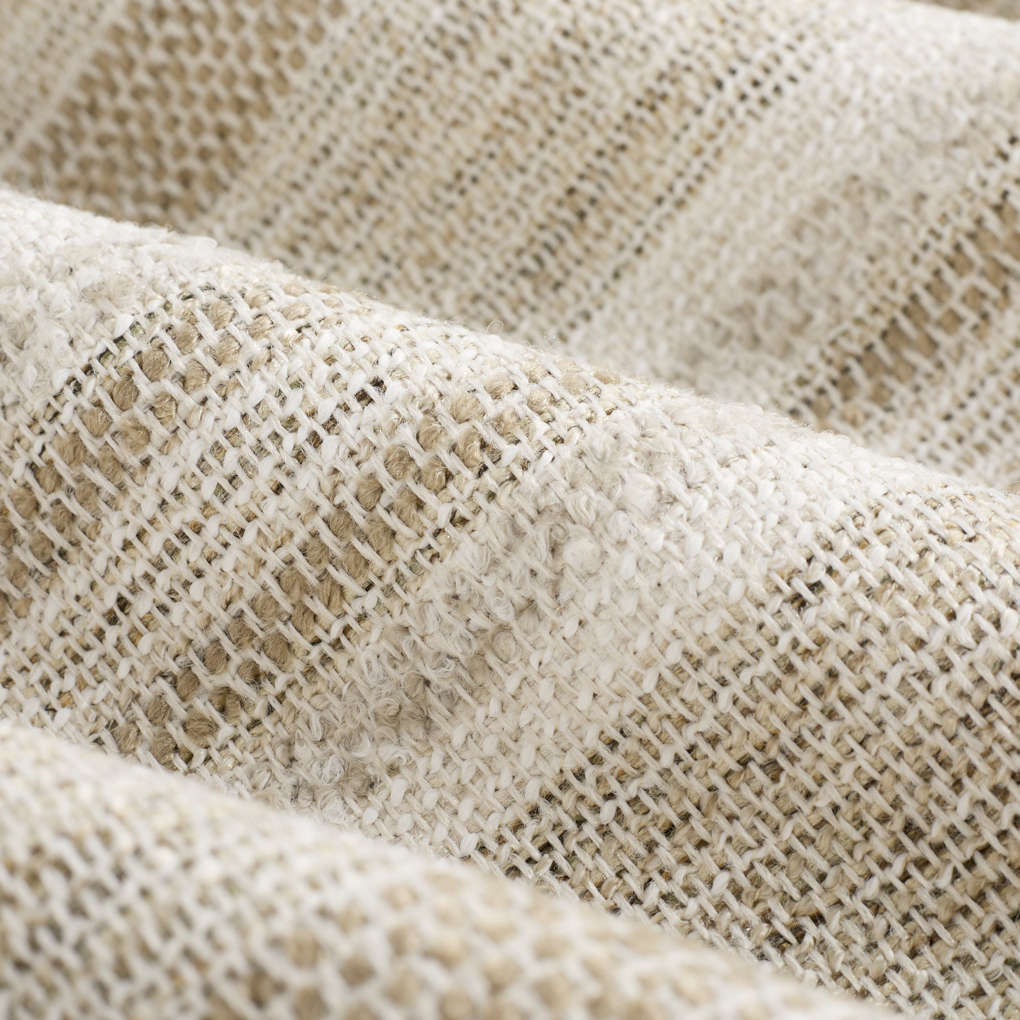 Close up of Tonic Living Indie Stripe Sand high-performance fabric showing sand, taupe, oatmeal, and warm white stripes.