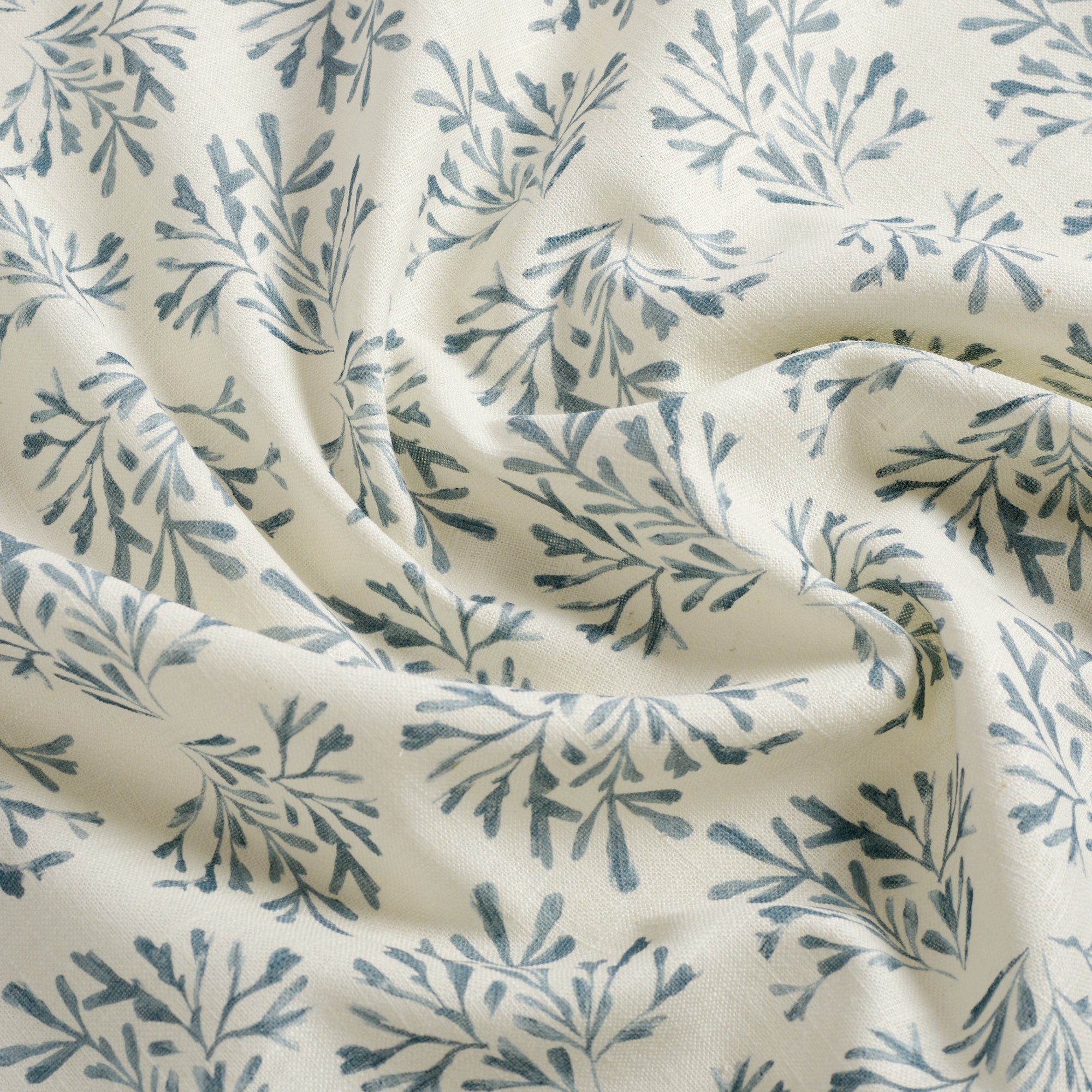 Tonic Living Juniper Harbour Blue fabric featuring a blue and white botanical sprig print.
