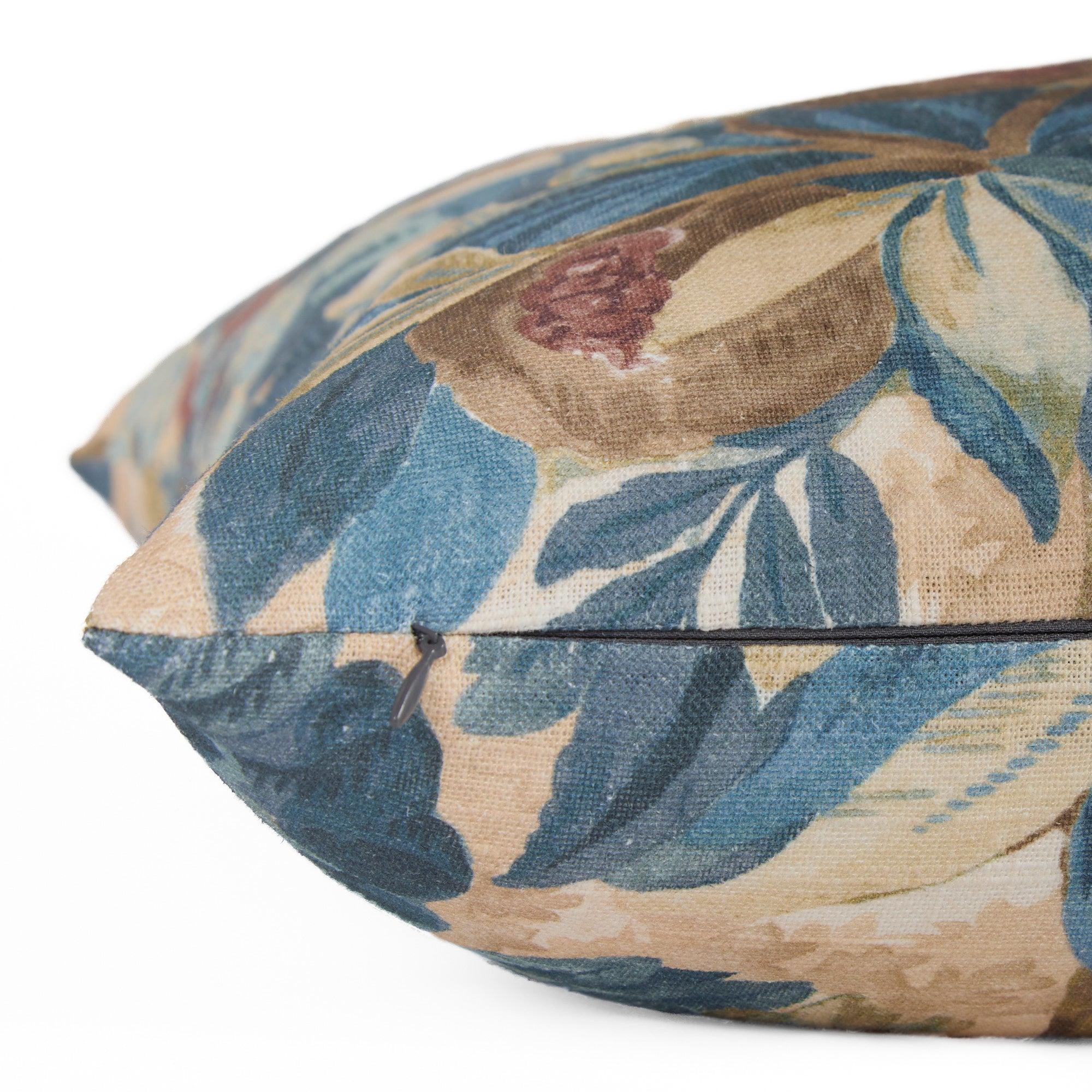 Side zipper detail of Juno 20x20 Pillow, Navy by Tonic Living — linen-blend pillow with a painterly navy and earthy floral print.