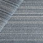 Kos Stripe Chambray, a denim blue with white boucle striped upholstery fabric from Tonic Living 