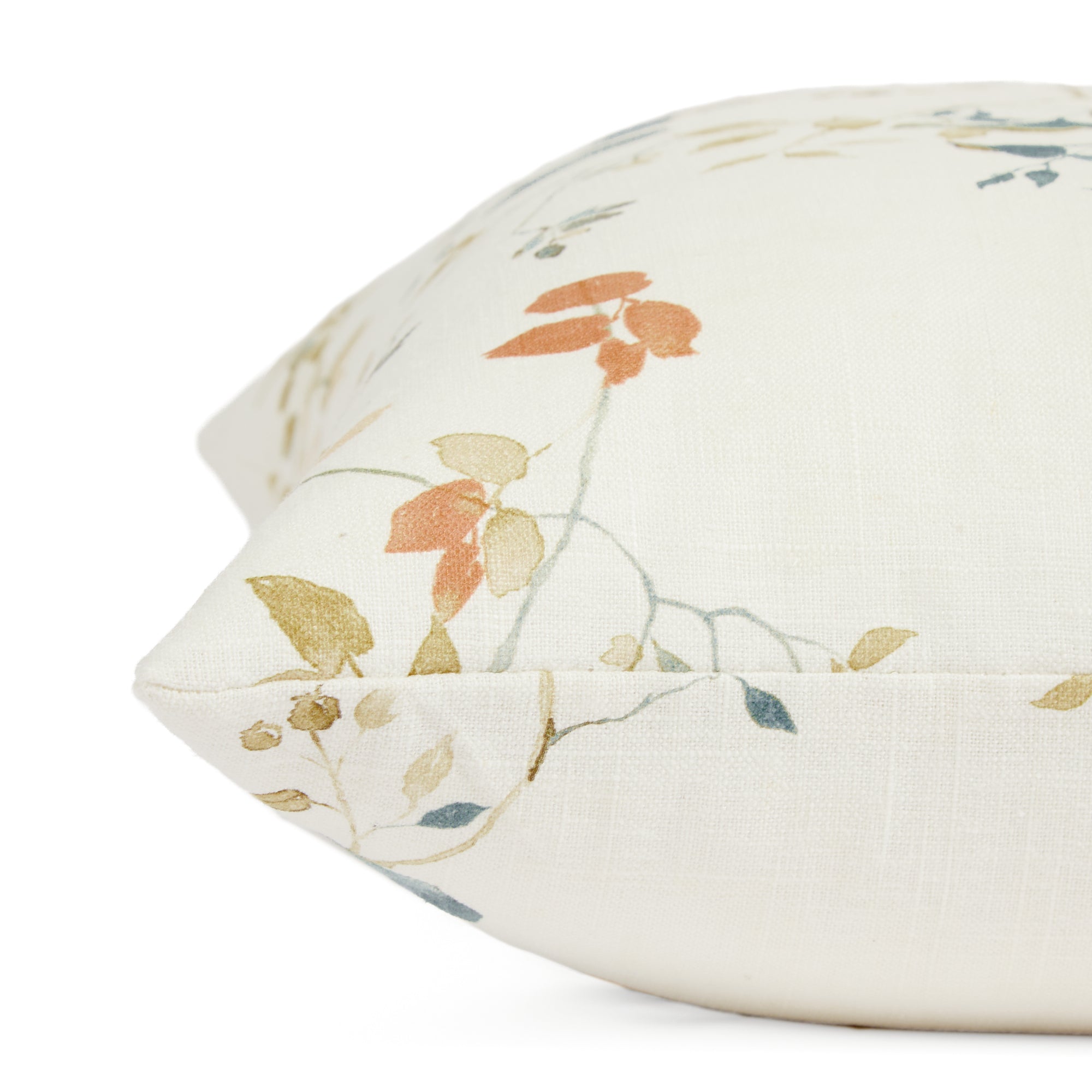 Side view of Tonic Living Laurel Meadow pillow highlighting its floral vine print design.