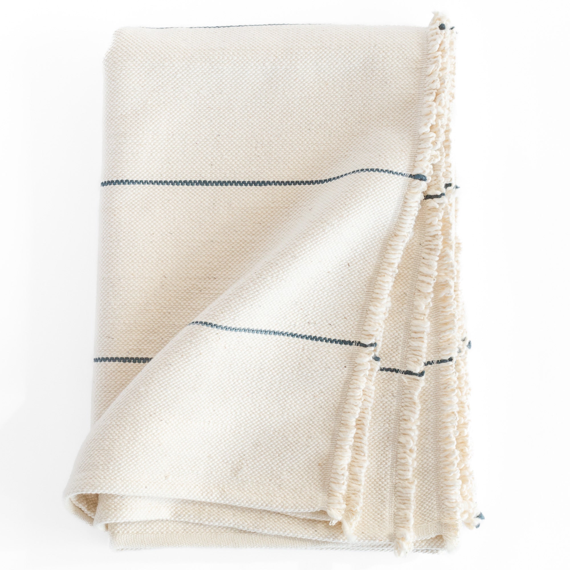 Lyra Throw Blanket, a cream and navy stripe cotton hand loomed throw blanket from Tonic Living