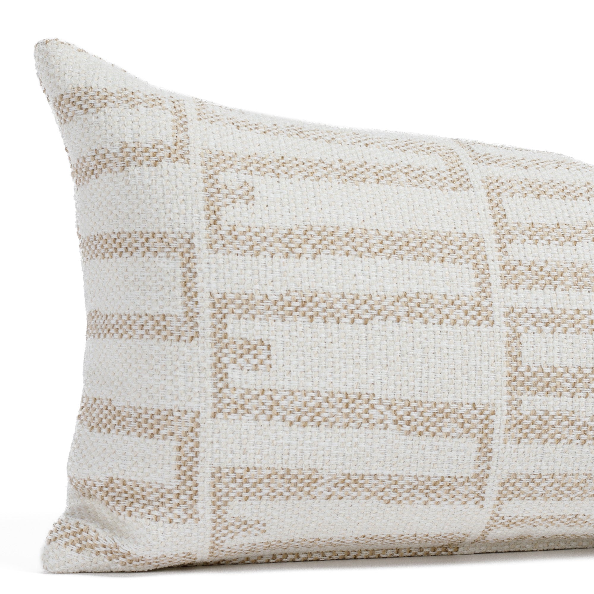 Close-up of the Mallia Toasted Coconut 12x24 decorative outdoor lumbar cushion by Tonic Living, showcasing the textured weave and organic beige-on-cream pattern.