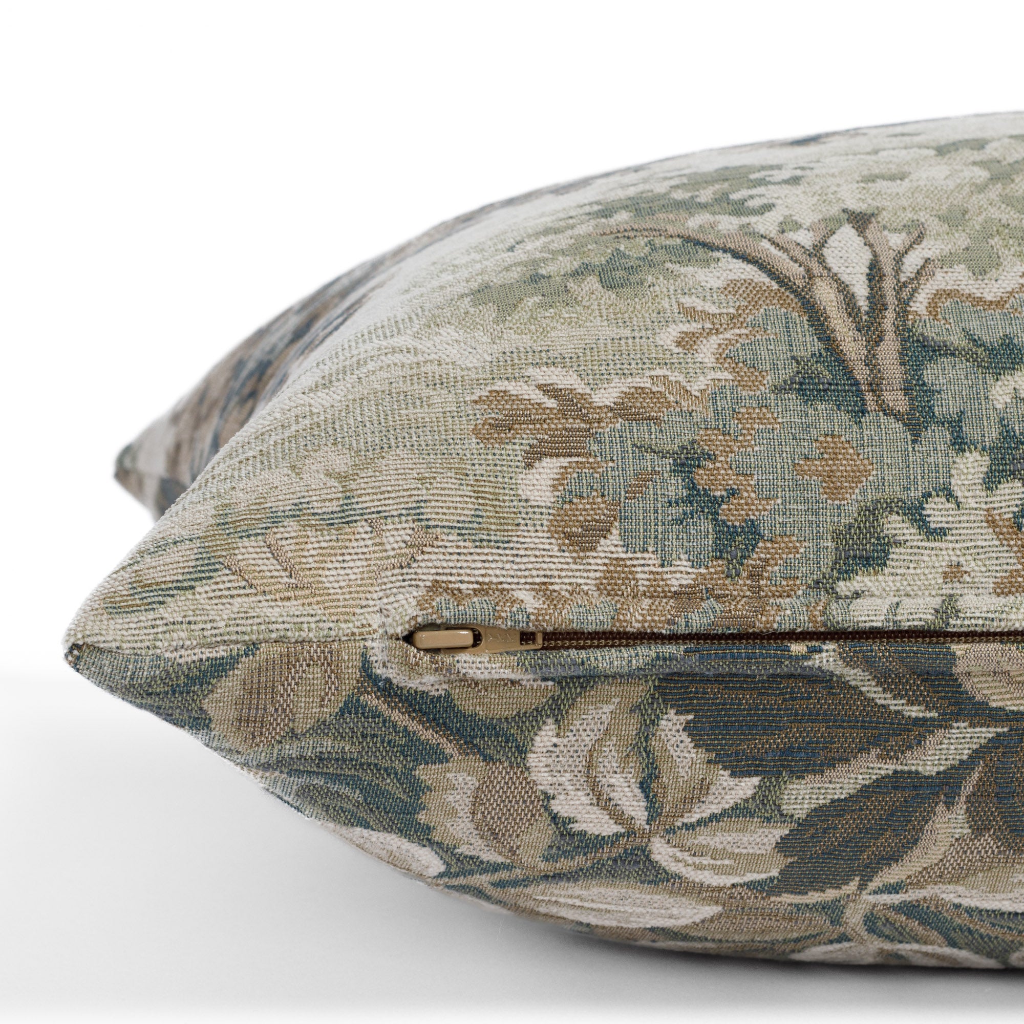 Zipper detail of Manor Tapestry Sage 16x42 lumbar bolster pillow in vintage-inspired tapestry fabric.