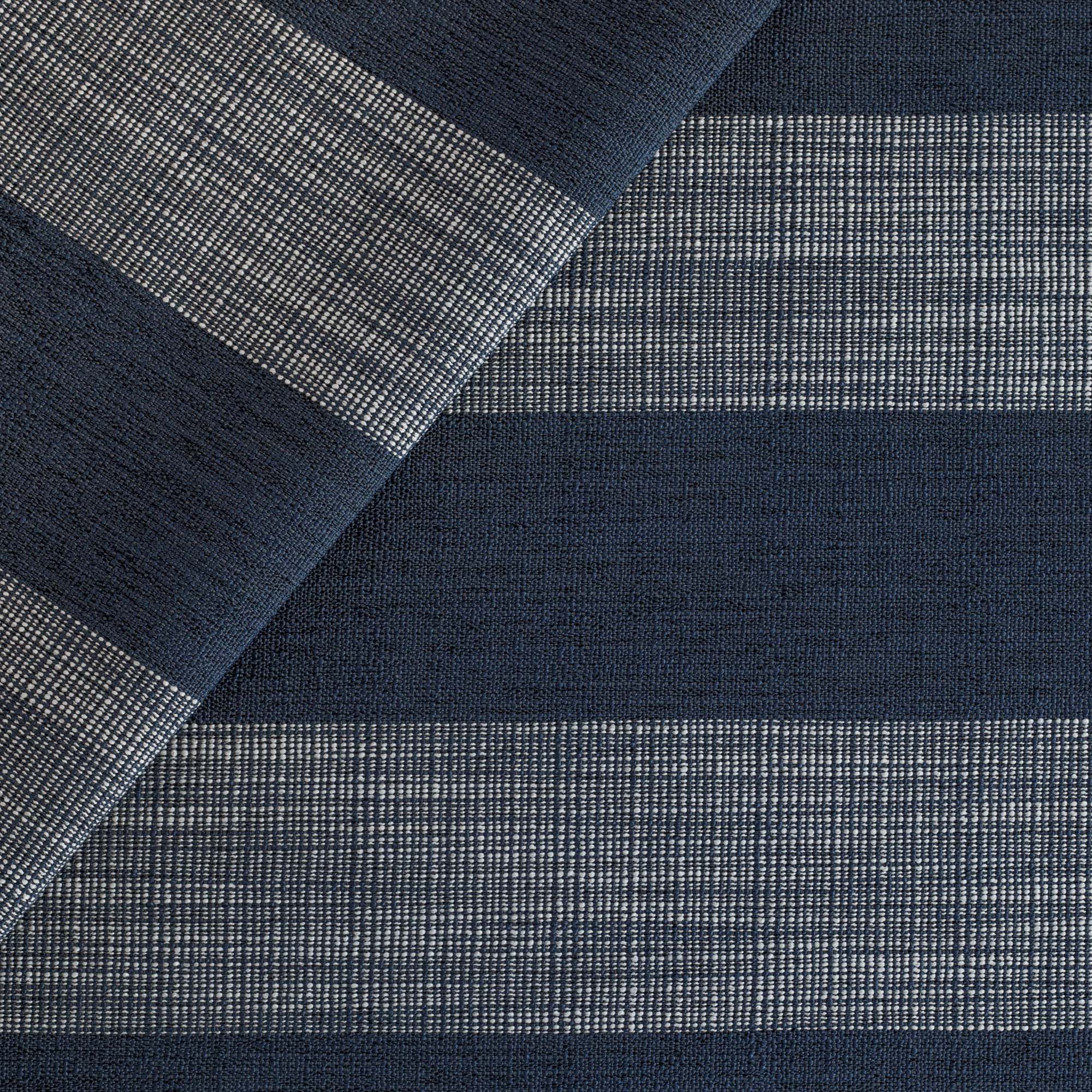 a deep navy blue and white wide striped upholstery fabric