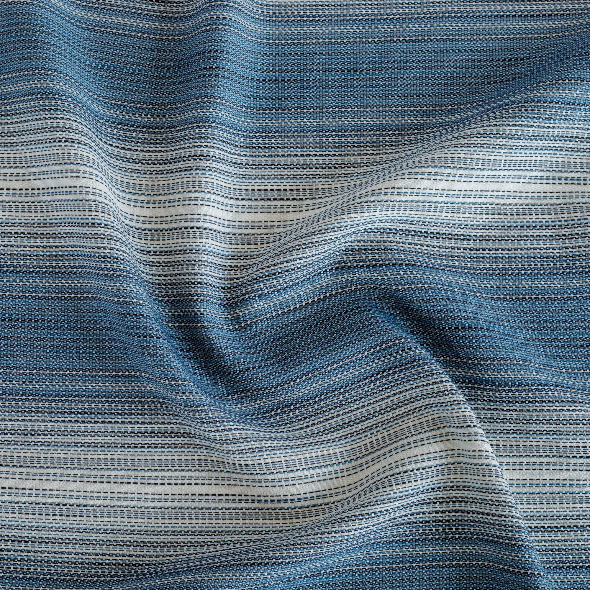 a blue and white stripe outdoor performance upholstery fabric