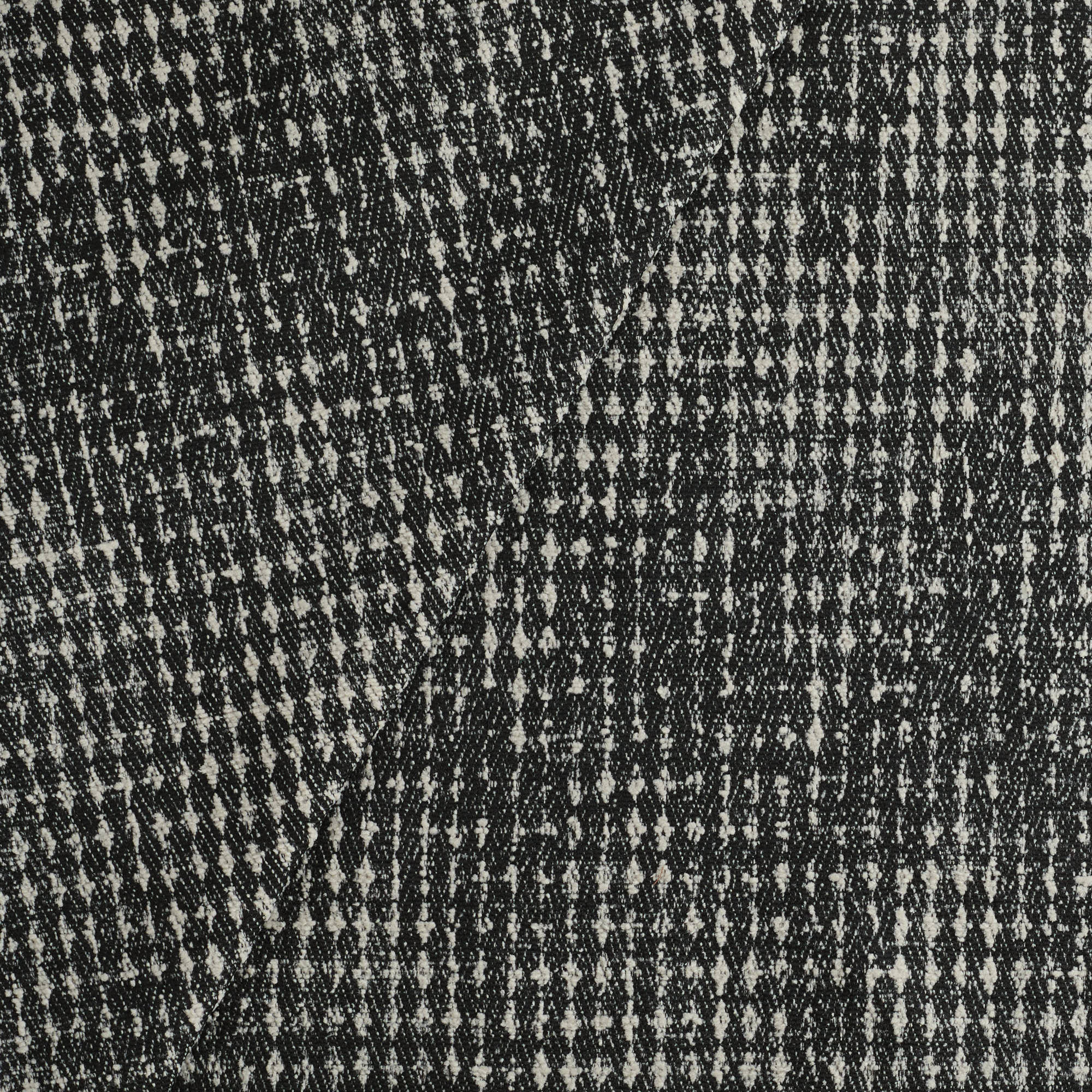 Otto Fabric, Domino by Tonic Living — black and white upholstery fabric with a graphic, modern take on classic houndstooth.