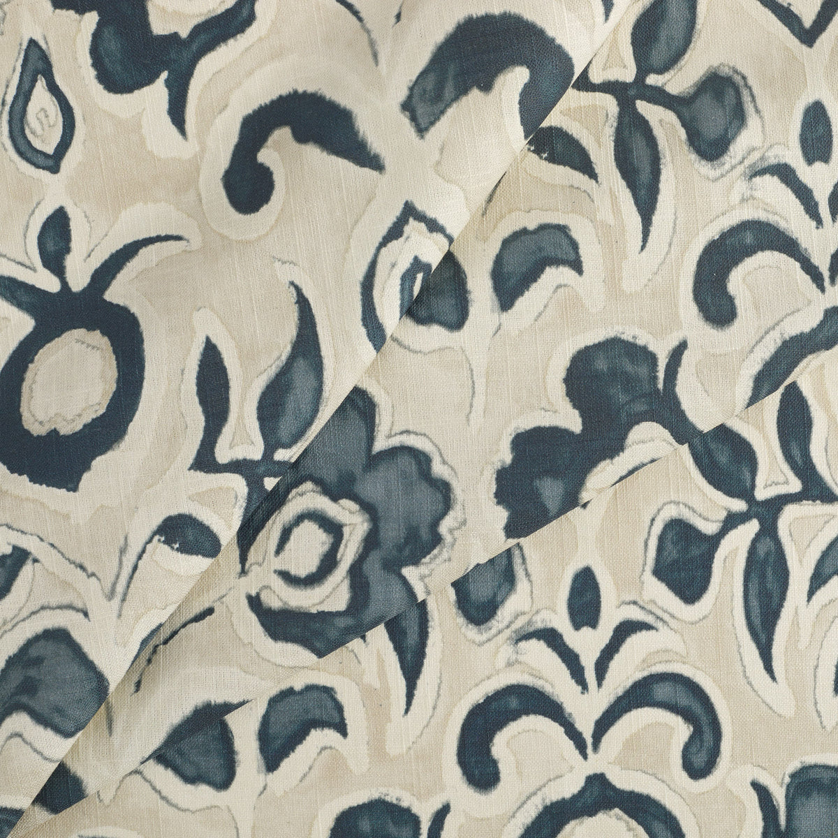 Tonic Living Paloma Fabric in Ink, a navy and oatmeal floral curtain fabric with a large-scale painterly botanical design.