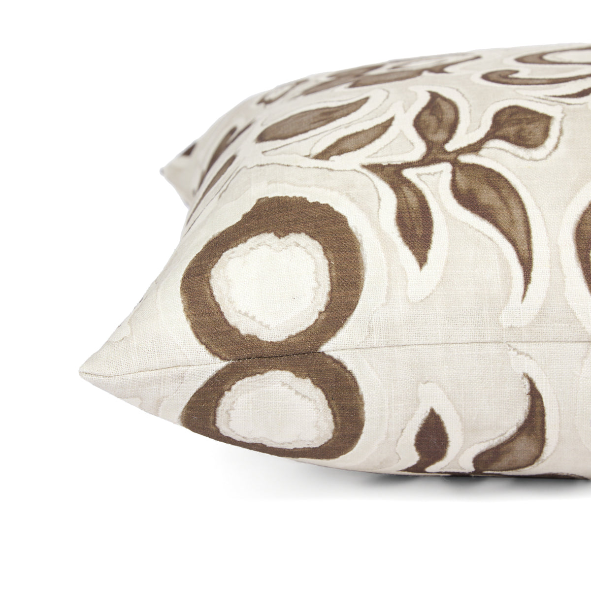Side view of Tonic Living Paloma Walnut toss cushion highlighting its stylized brown floral pattern and soft neutral palette.