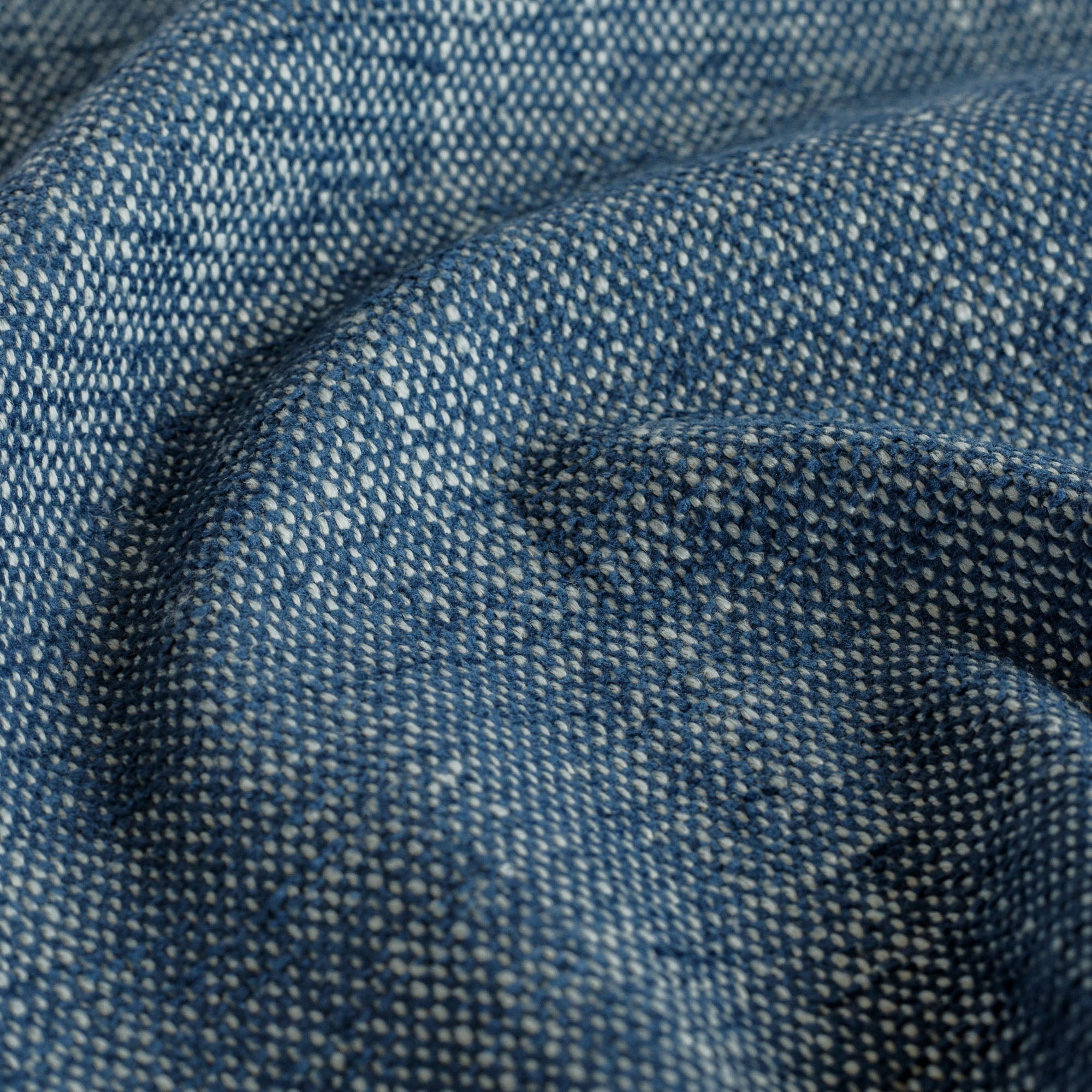 an indigo blue chenille upholstery fabric : close up view
